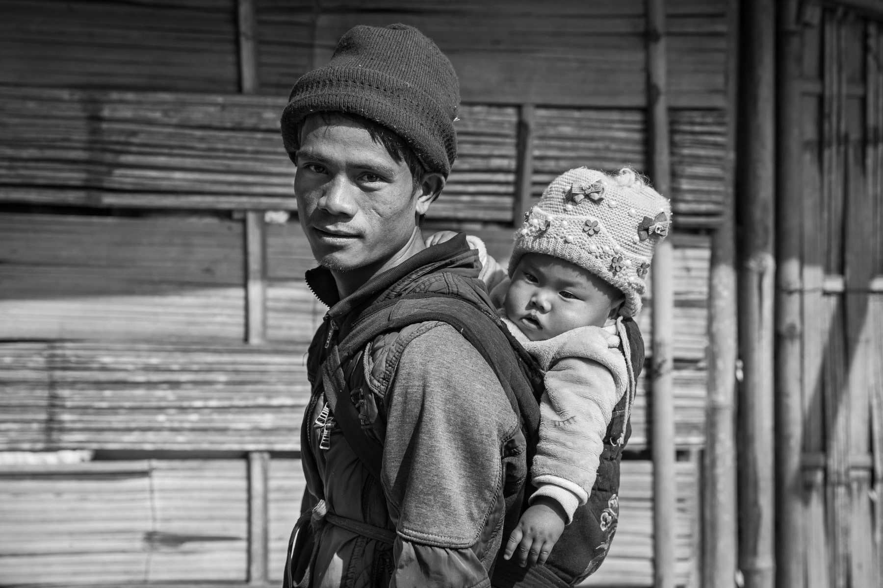 Kachin and his child from the Kashi ethnic group expelled from his village in 2016. The village is near the territory controlled by the Kachin Independence Army and is now located in a combat zone. They found shelter on a piece of land owned by the Church of Christ, a Christian group to which they belong. CoC IDP Camp, Waimaw, Kachin State, February 2020