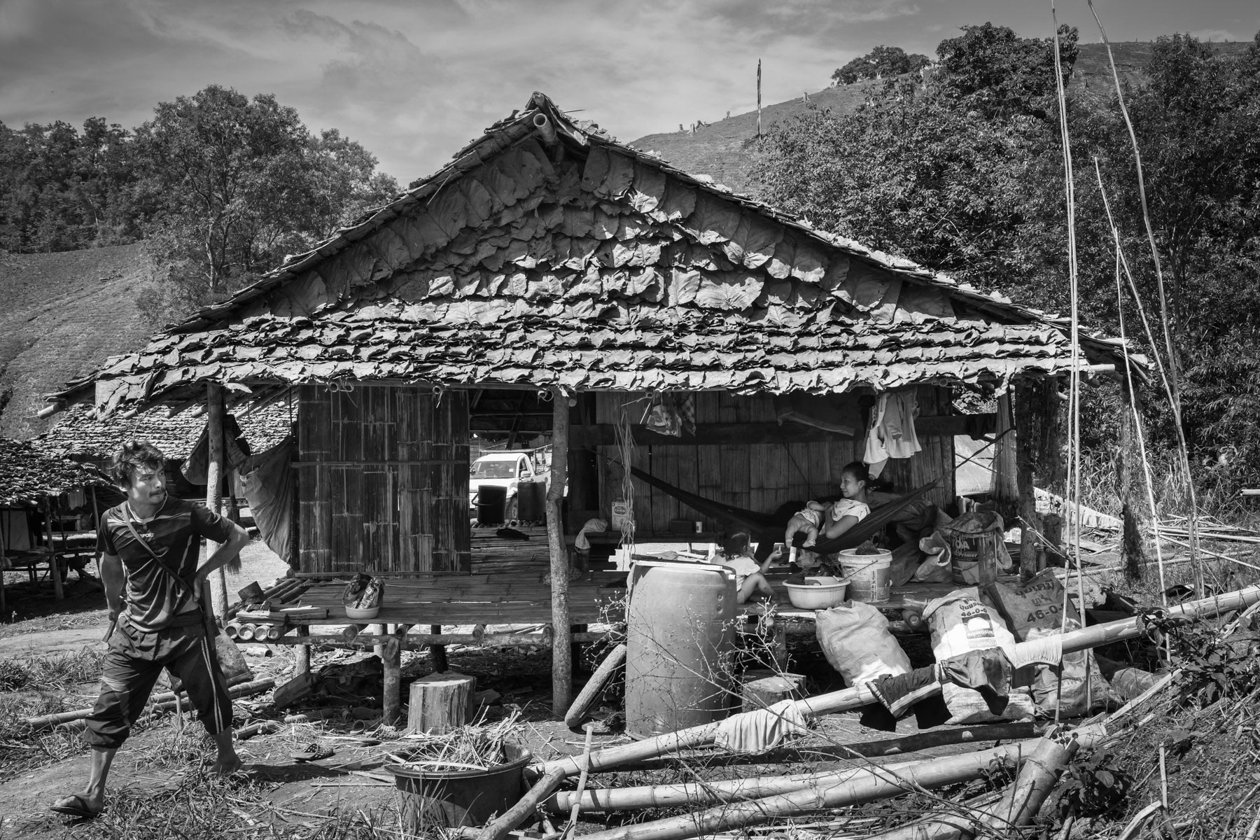 A Karen internally displaced family in a camp near the Thai border in territory controlled by the Karen National Liberation Army (KNLA). Kanele IDP camp, Way Lay, Kayin State, Myanmar. June 2022