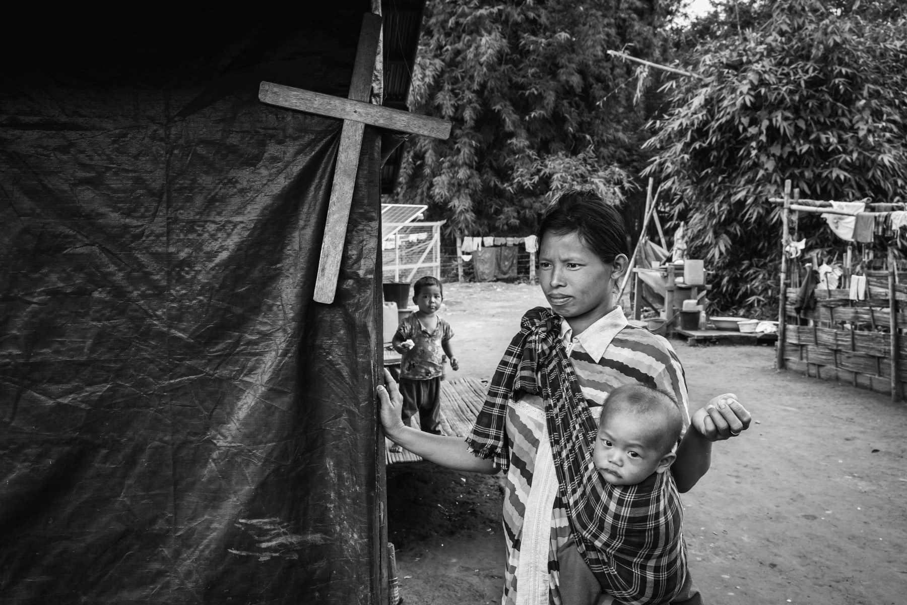 Shelter for Kachin internally displaced persons. All IDP camps in government controlled territory have been set up on land owned by local Christian churches as government land was not made available. The majority of Kachin follow the Christian faith. St-Joseph IDP camp and its 2000 residents, Myitkyina, Myanmar, September 2019