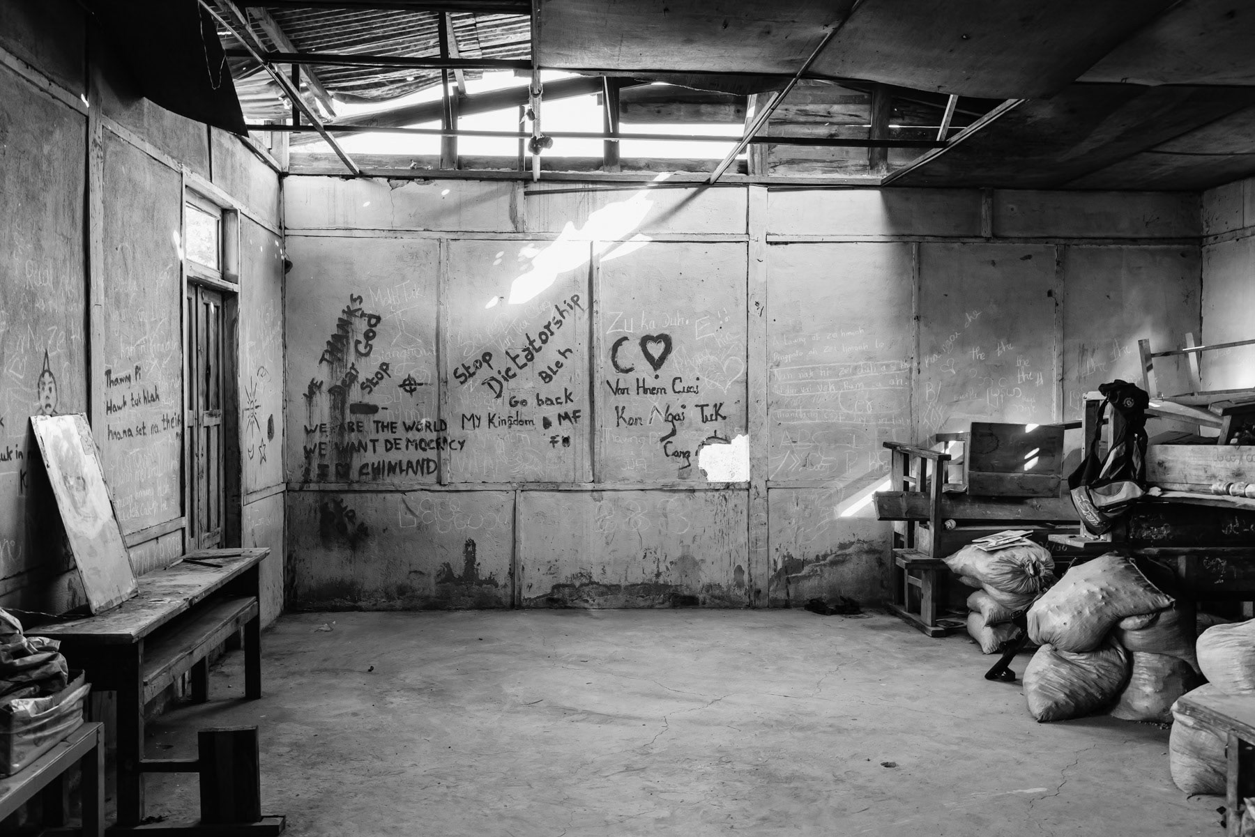 Chin Defense Forces (CDF) frontline in a school facing the Myanmar military positions. The town has been emptied of its civilian population and is since then bitterly fought over. At this stage both sides control more or less 50% of Thantlang. Thantlang school building, Chin State, Myanmar, April 2024