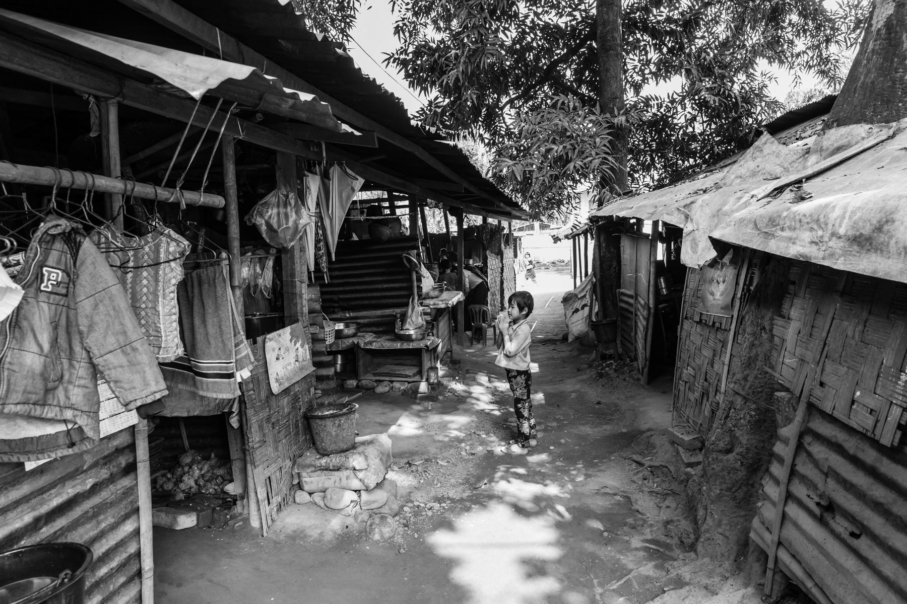 KBC Compound IDP Camp in Kachin State and one of its 435 residents. More than 100,000 Kachin are still displaced within Kachin State since the armed conflict resumed in 2011 between the Myanmar military and the Kachin Independence Army (KIA). Momauk township in government controlled territory, Myanmar, January 2020