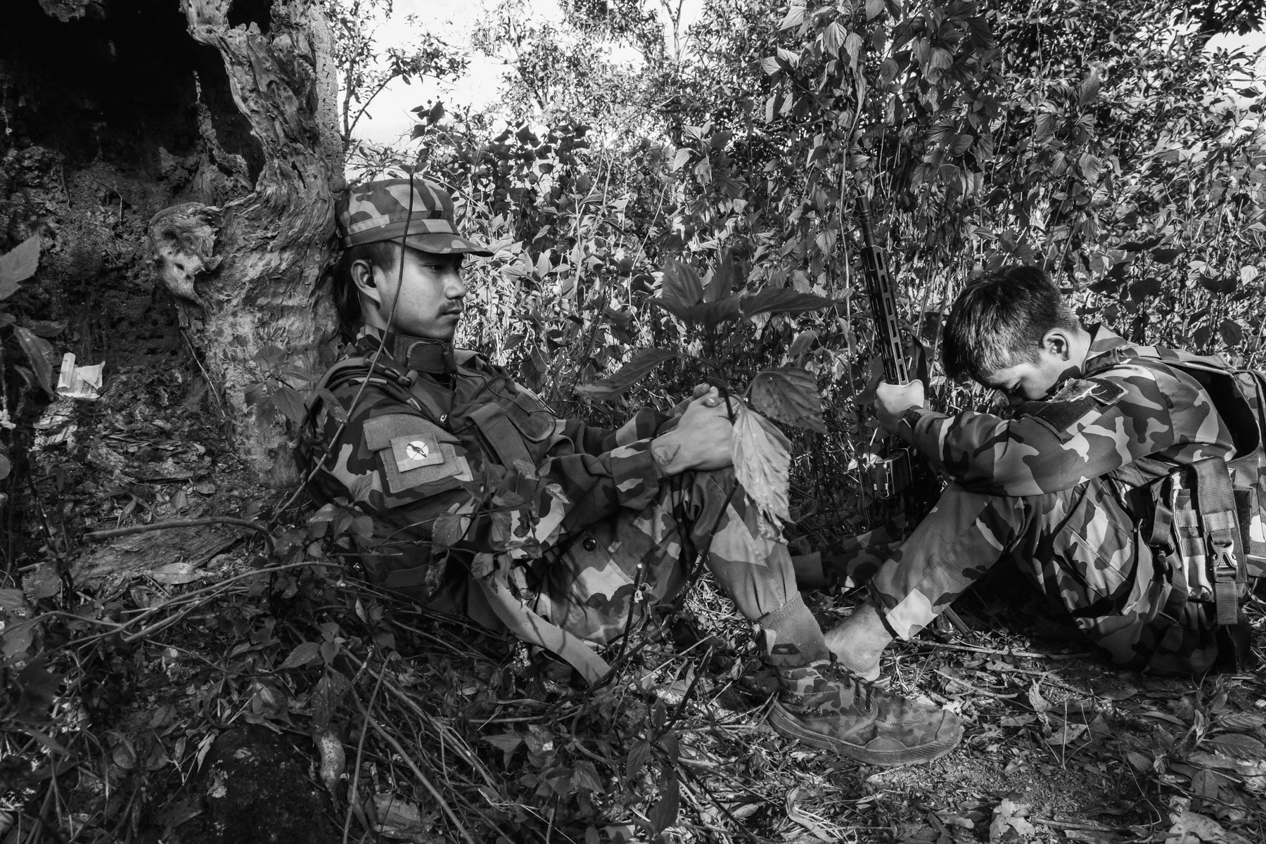 Chin National Defence Forces at a frontline facing a Myanmar military base in the mountains of Falam Township in Chin State. Since the military coup in Myanmar, people have taken up arms throughout the country to resist and defend themselves against atrocities committed by Tatmadaw, the Myanmar military who supressed civilian rule in February 2021. CNDF Frontline, Myanmar, November 2022