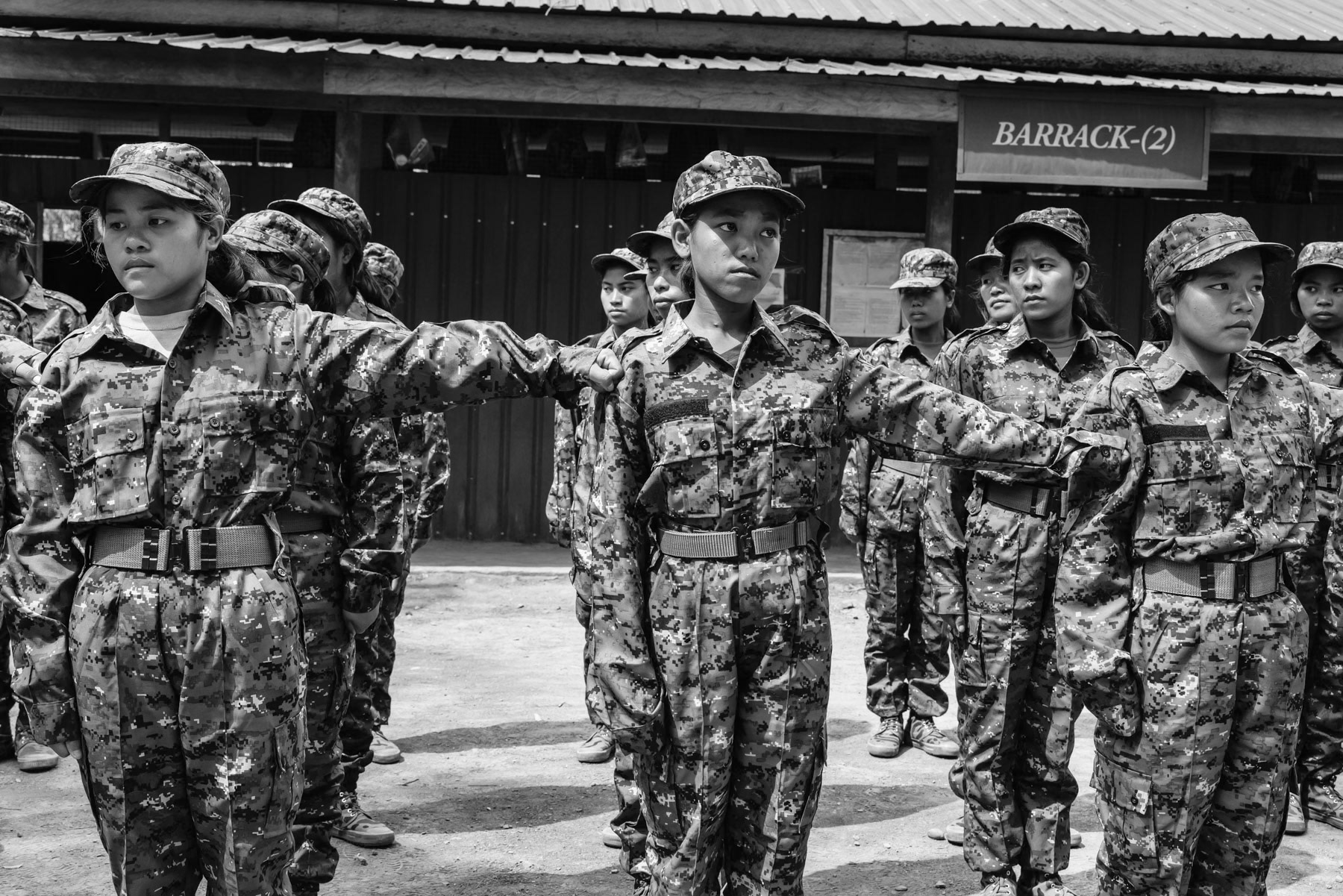 Women new recruits for the Chin National Army (CNA) undergoing a lenghty training before integrating supporting functions within the CNA. Camp Victoria in Chin State, Myanmar, April 2024