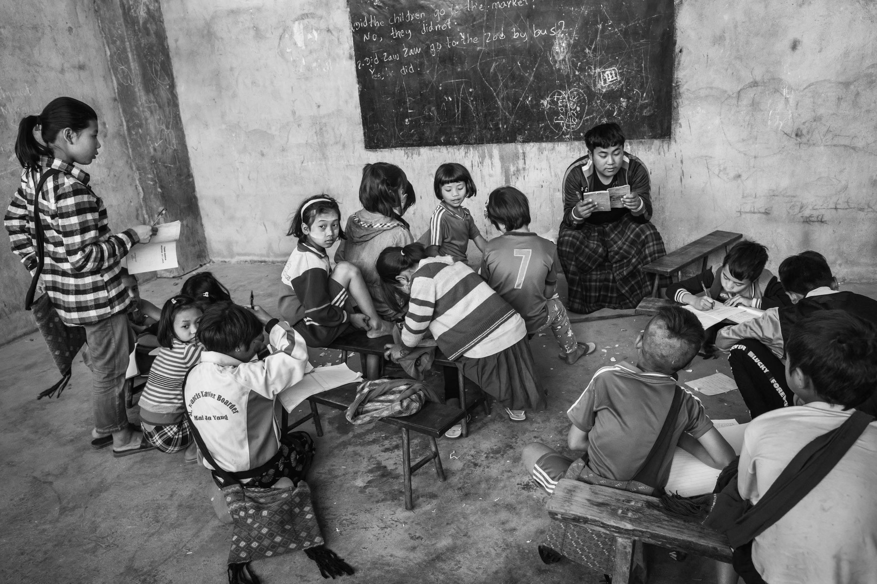 Summer class for Kachin children displaced by the ongoing conflict between the Myanmar military forces and the Kachin Independence Army (KIA). Pa Kahtawang IDP camp in KIA controlled territory, Mai Ja Yang, Kachin, Myanmar, April 2019