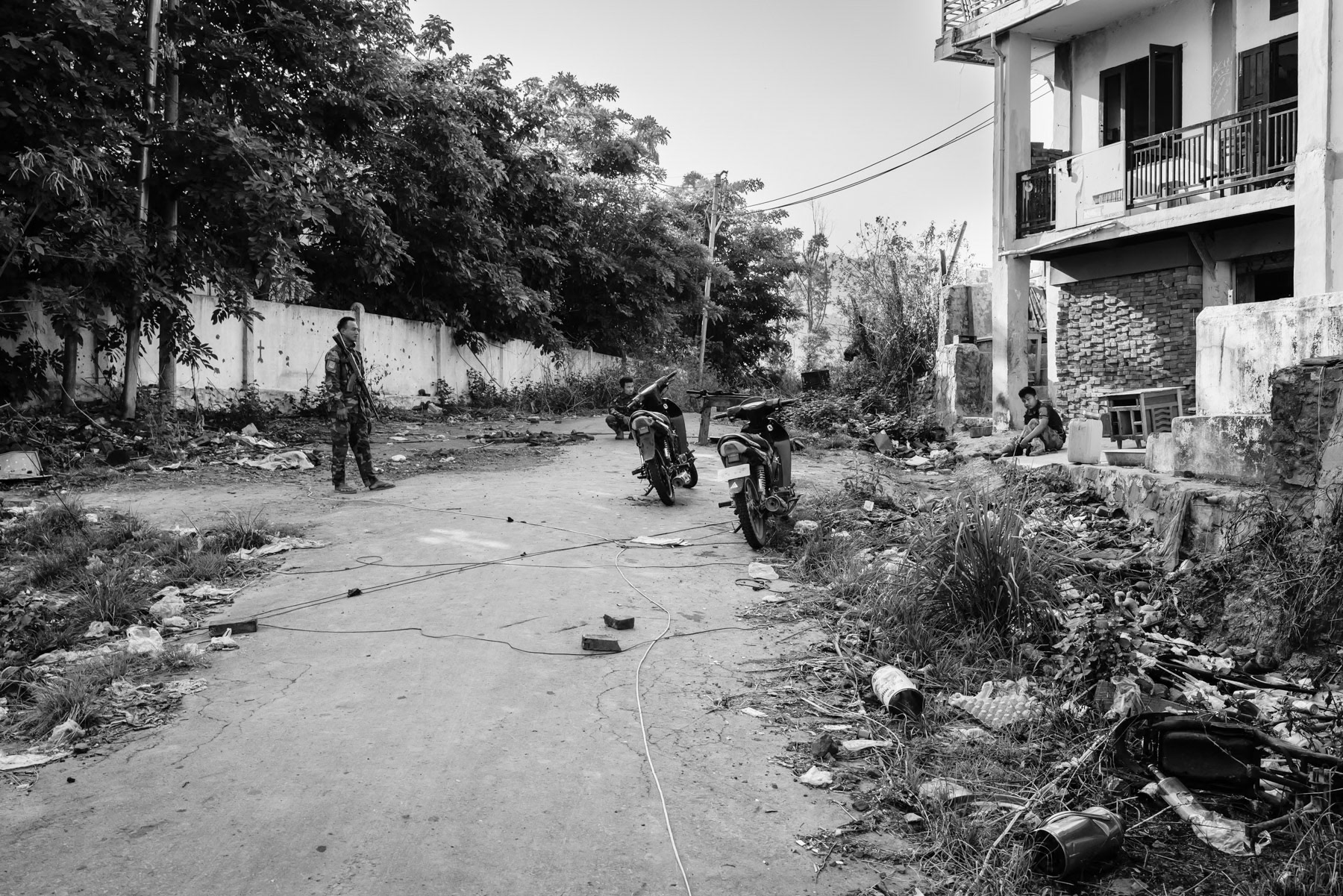 Chin National Army (CNA) and Chin Defense Forces (CDF) position on the frontline facing the Myanmar military a couple of hundred meters away. Thantlang downtown, Chin State, Myanmar, April 2024