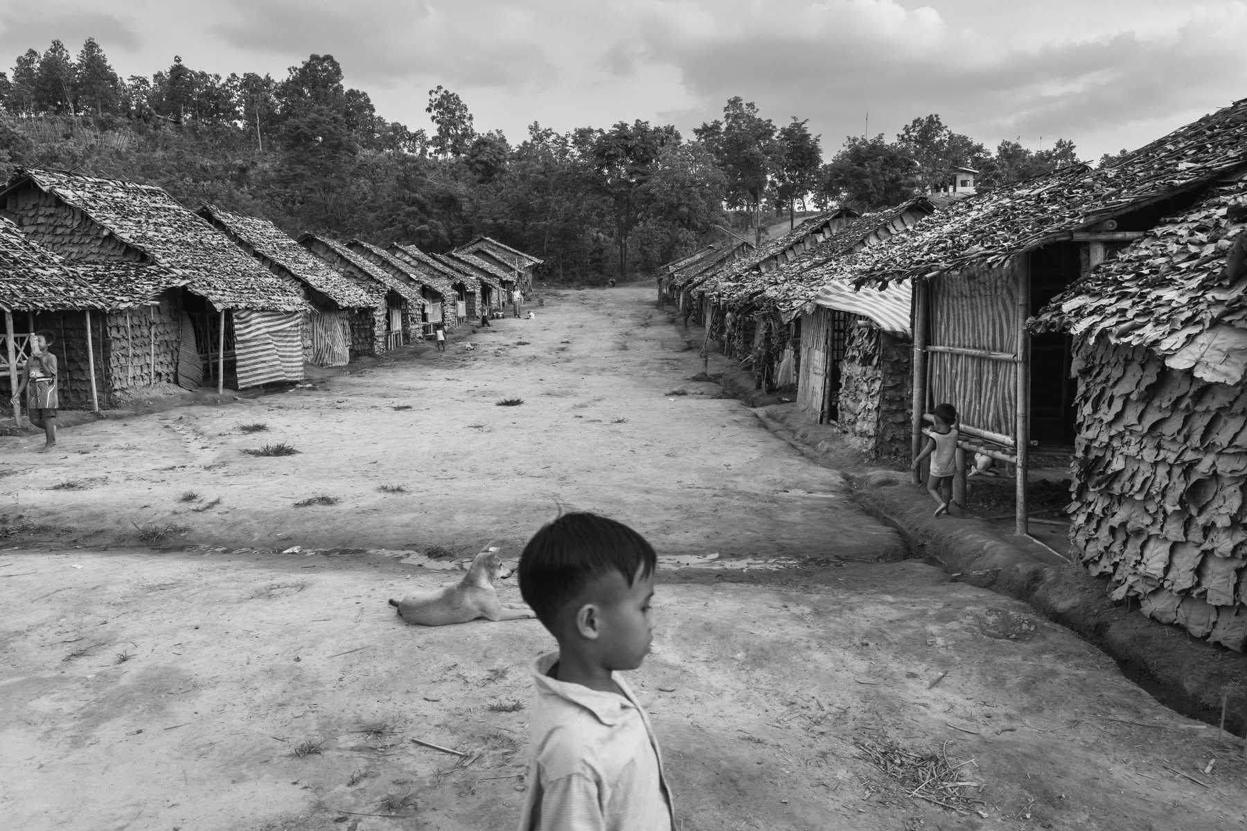 Lae Gho IDP camp recently established for persons of the Karen ethnic minority fleeing persecution and military attacks in their villages in Kayin State. Widwspread terror and attacks against civilians and ethnic minorities have substantially increased since the military coup in 2021, provocing large numbers of displaced persons and refugees. Lae Gho IDP Camp, Kayin, Myanmar, June 2022