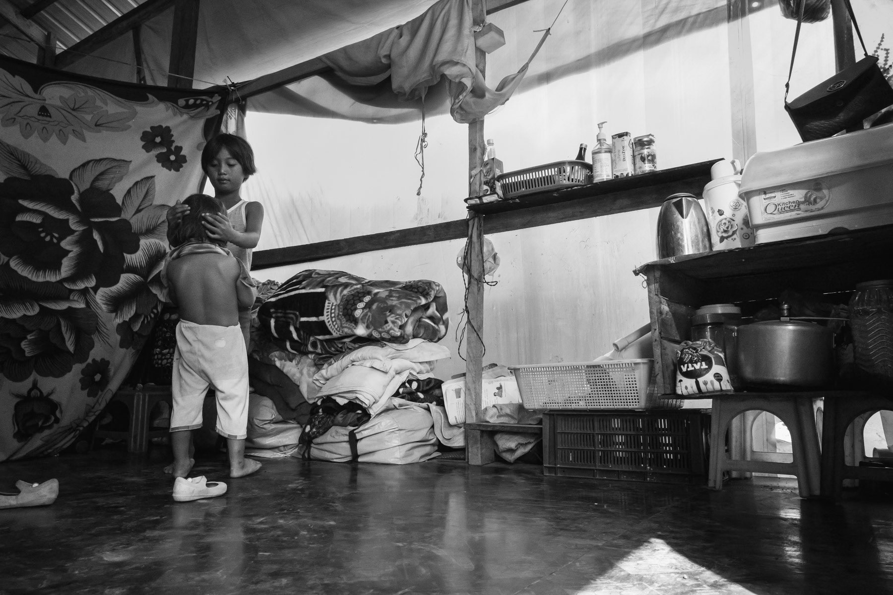 Chin children in their temporary shelter in a refugee camp on the border with Myanmar. Zokhawthar, Mizoram in India, November 2022