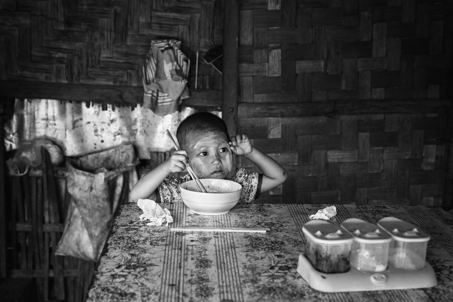 Kachin child having lunch, Maina IDP camp, Kachin State, Myanmar, September 2019