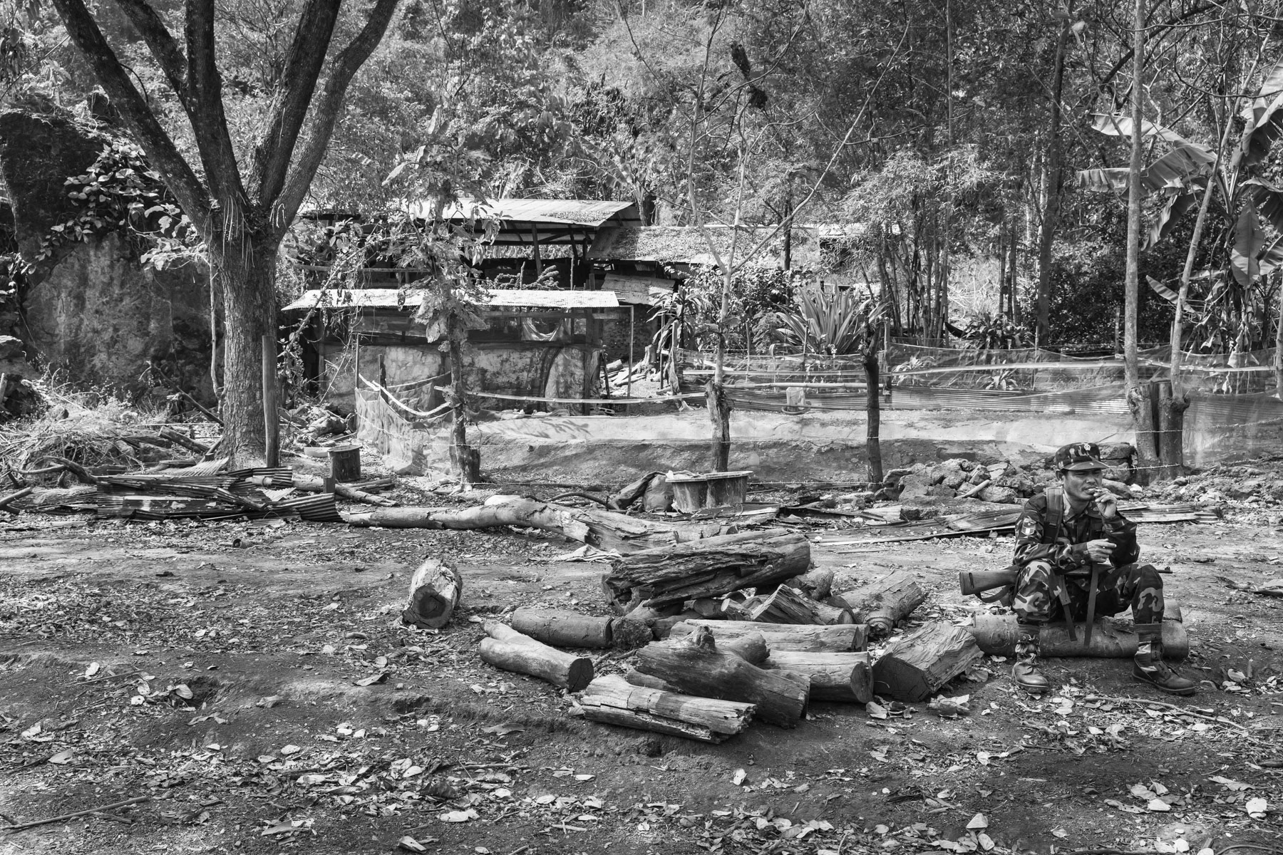 KNDO soldier during a break. Kaw Tho Lei, Kayin State, Myanmar, March 2019