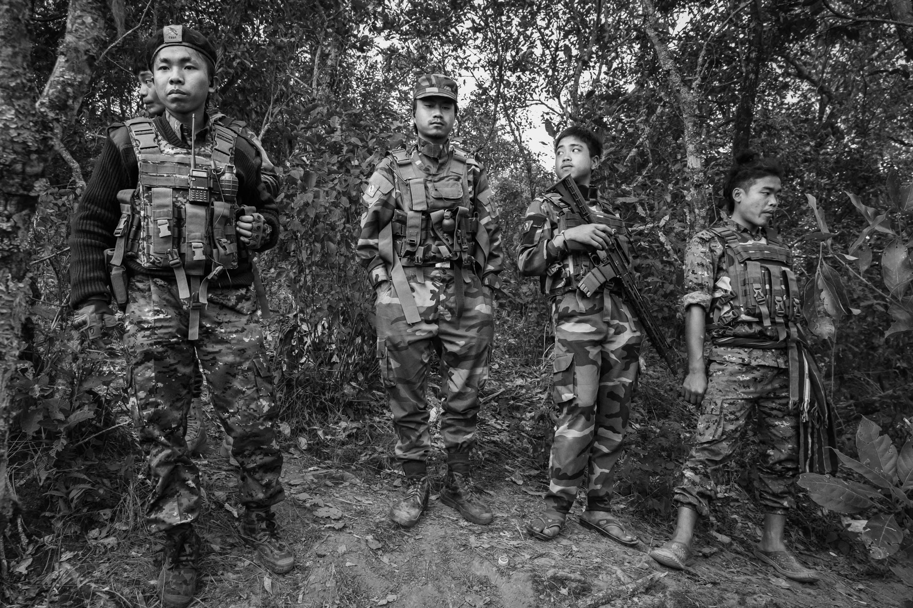 Chin National Defence Forces on a frontline facing a Myanmar military base in the mountains of Falam Township in Chin State. Since the military coup in Myanmar, people have taken up arms throughout the country to resist and defend themselves against atrocities committed by Tatmadaw, the Myanmar military who supressed civilian rule in February 2021. CNDF Frontline, Myanmar, November 2022