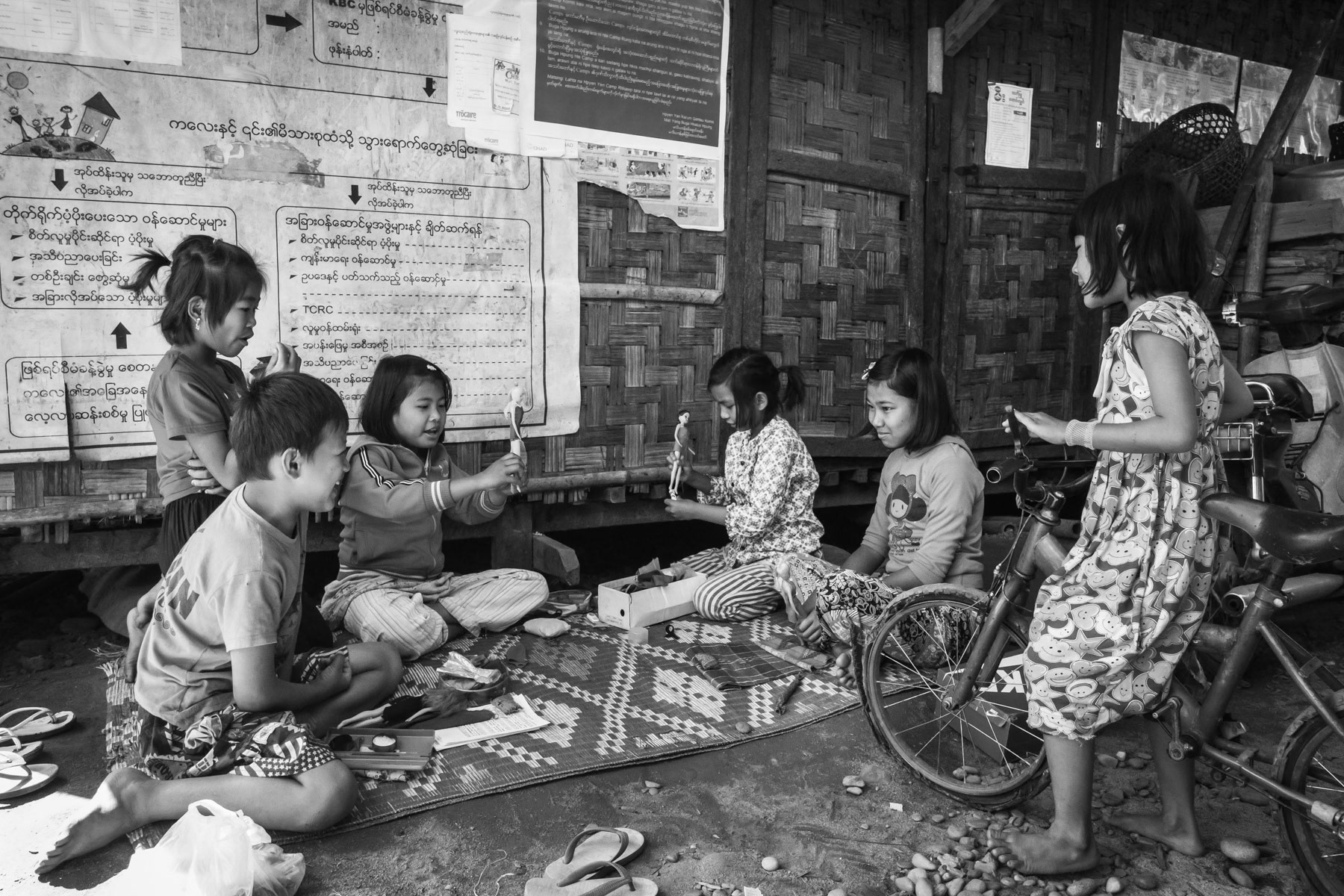Kachin children playing in an IDP camp built on the church compound. Over 100,000 Kachin are displaced within the Kachin State since the armed conflict resumed in 2011 between the Myanmar military and the Kachin Independence Army (KIA). Mali Yang IDP camp near Myitkyina in government controlled territory, Myanmar, March 2019
