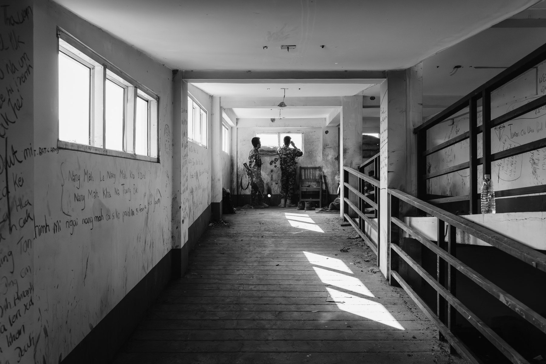 Chin Defense Forces (CDF) sniper positions on the frontline in the hospital building. Merely 200m separates their position from the Myanmar military posts. Thantlang hospital, Chin State, Myanmar, April 2024
