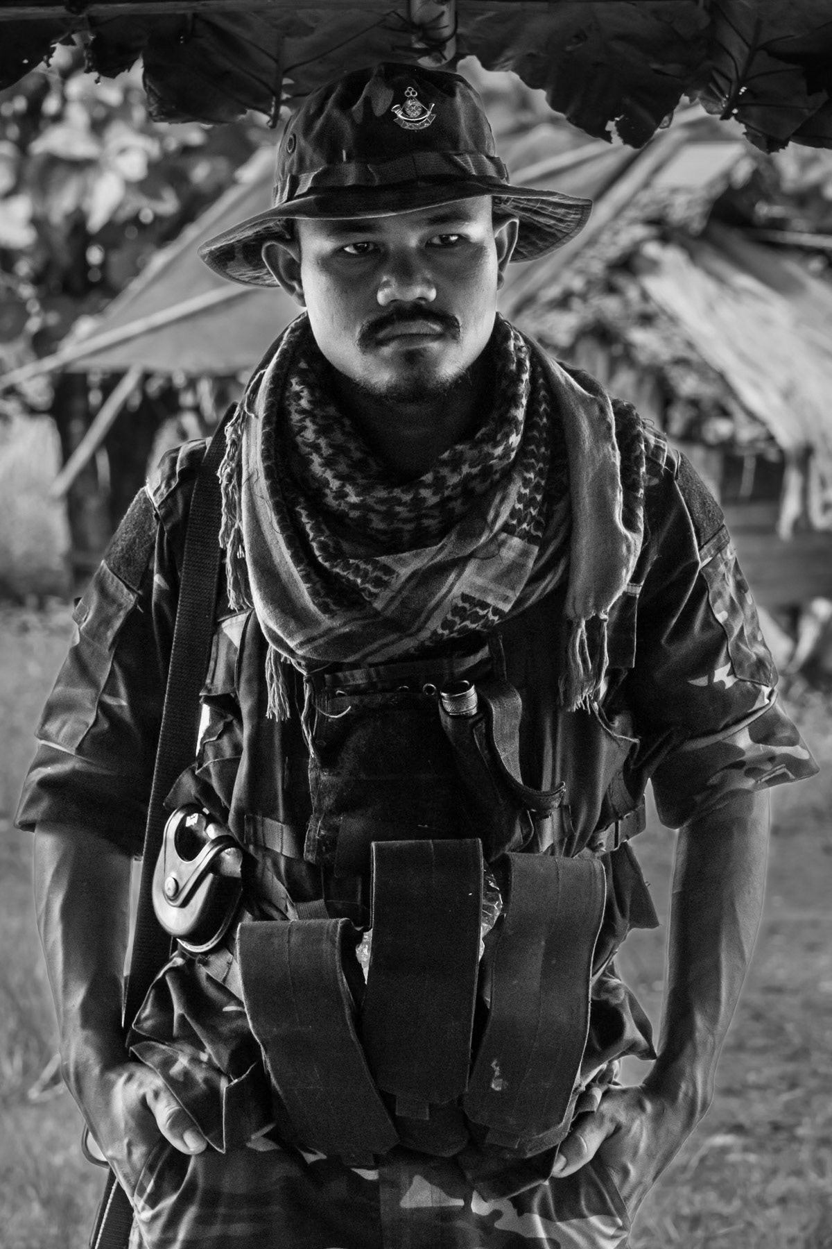 Soldier of the Karen National Liberation Army, one of the many ethnic armed groups involved in the armed uprising against the military dictatorship. Kaw Hlauk near the frontline around the town of Walay in Kayin State, Myanmar, October 2023