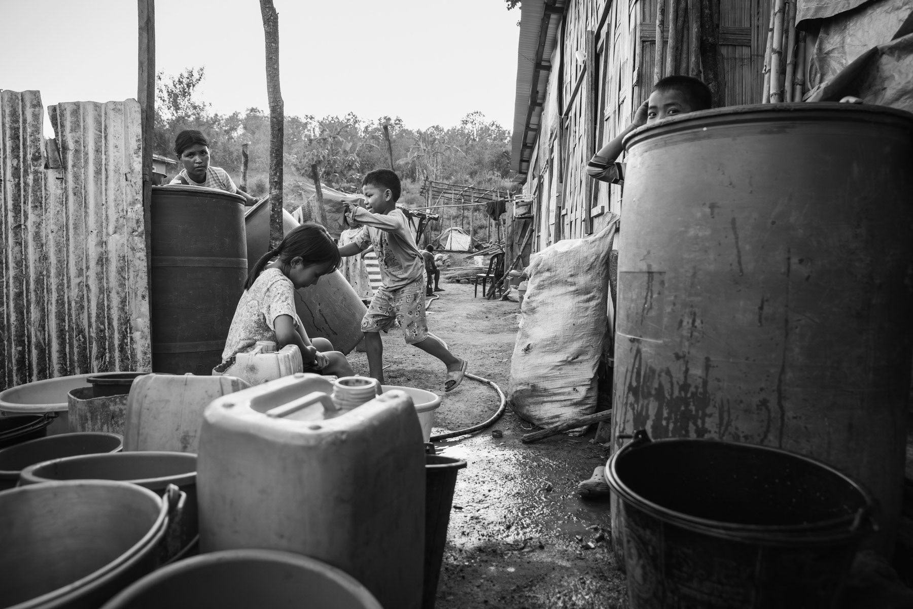 Recently arrived refugees from Chin State in Myanmar. With ever increasing airstrikes against villages, more and more people cross into India seeking safety and refuge. Hill camp for Chin refugees mainly from Falam and Kalay. Zokhawthar in Mizoram along the Indian-Burmese border. May 2023