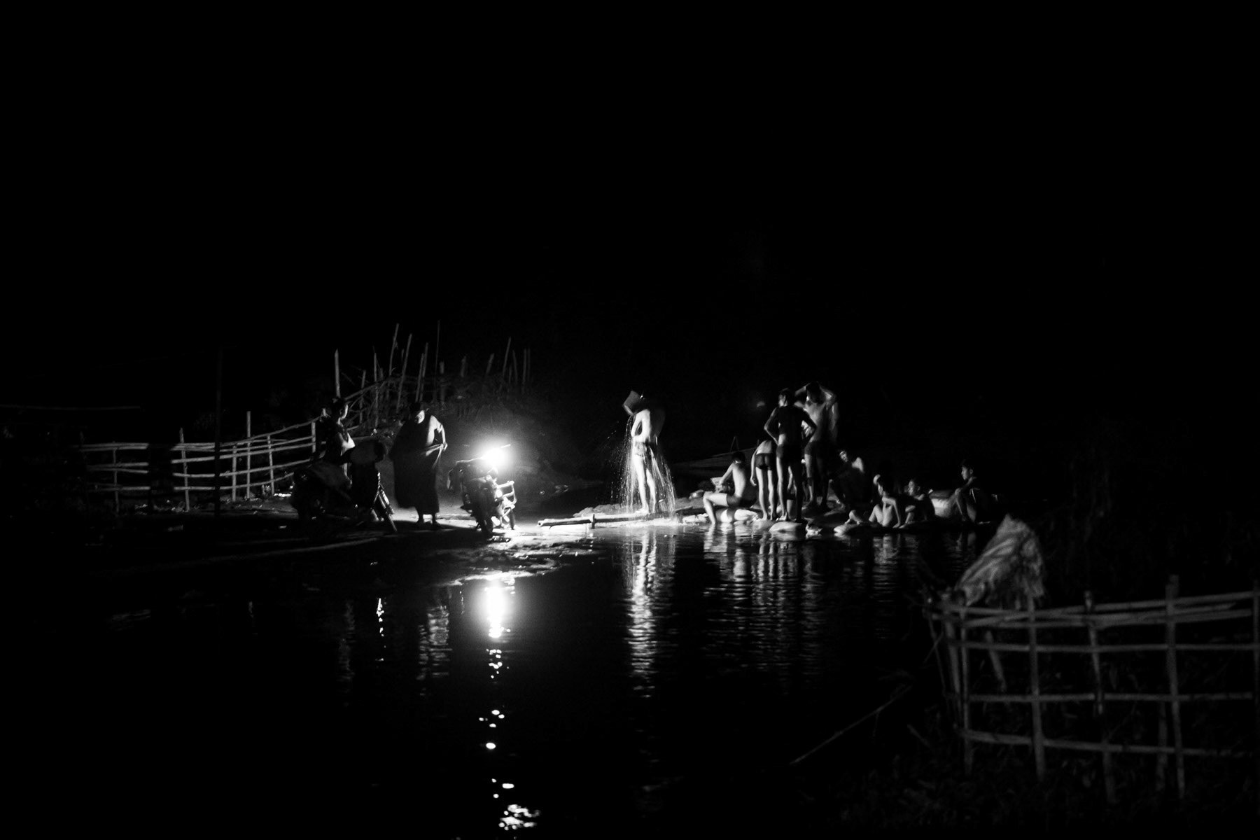 Kachin people bathing at a warm water source in Momauk, Kachin State, Myanmar, January 2020