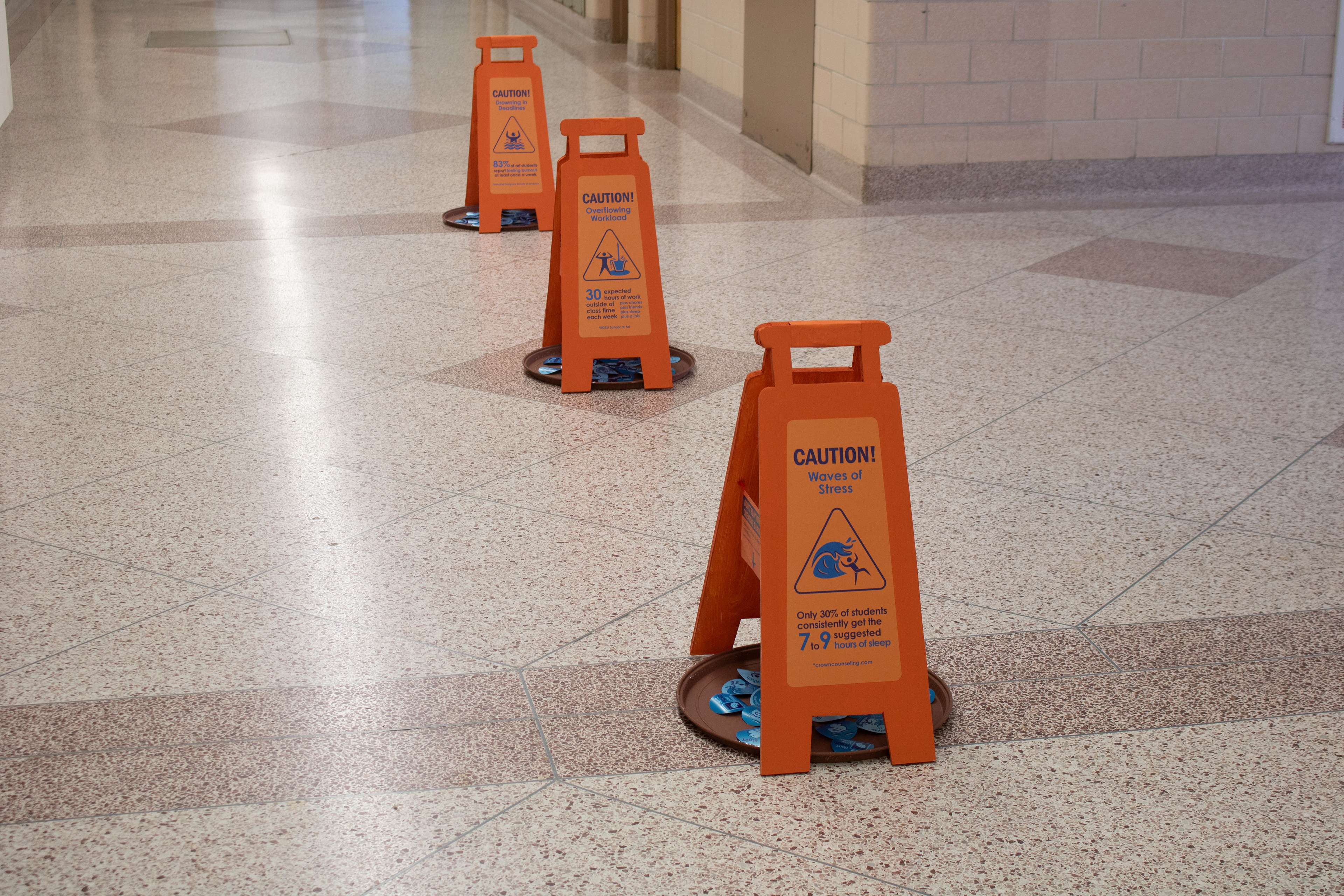 Wet floor signs made of foamboard.