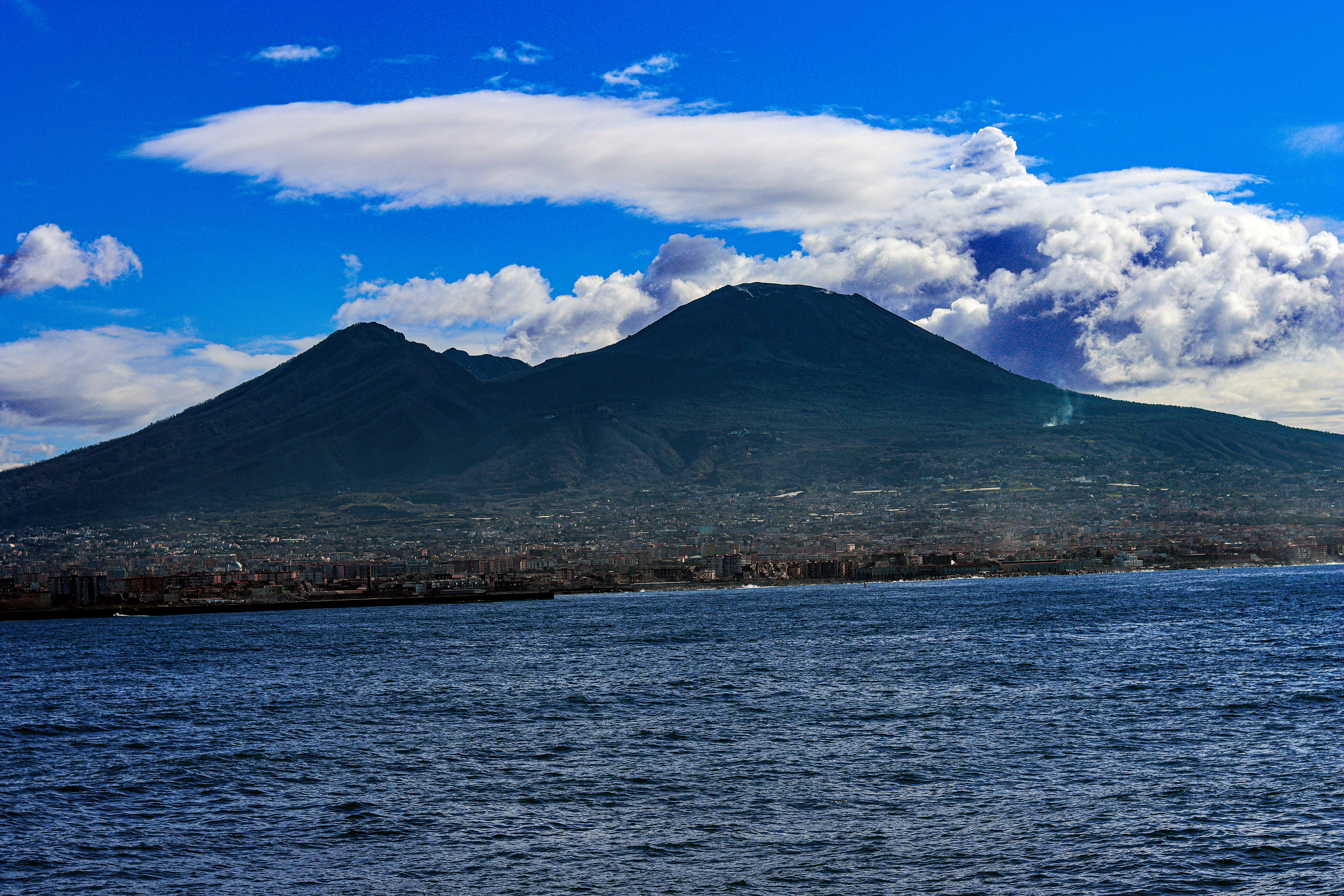 All the time the volcano looms over.