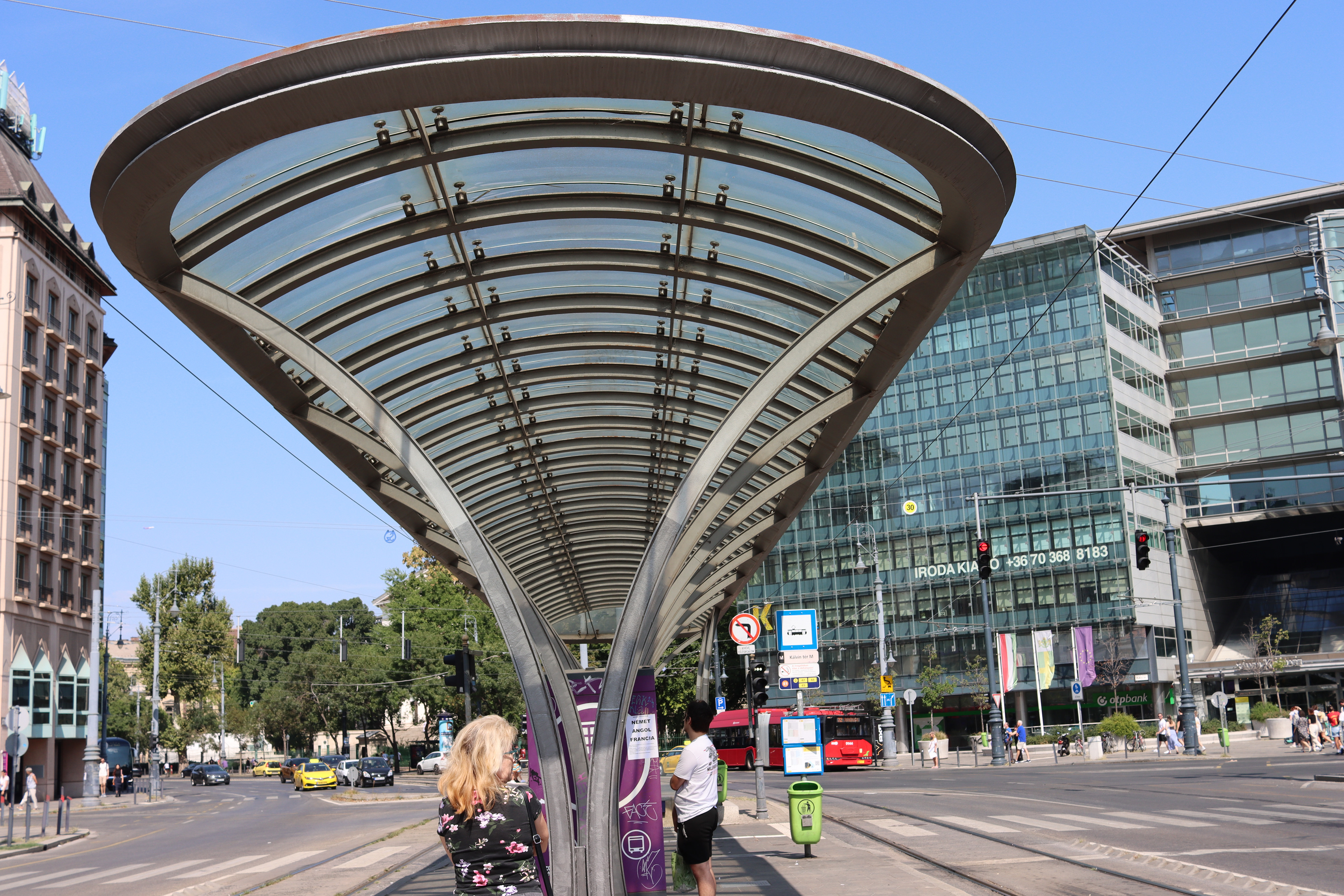 A tram and trolley bus stop (in the middle of the road)
