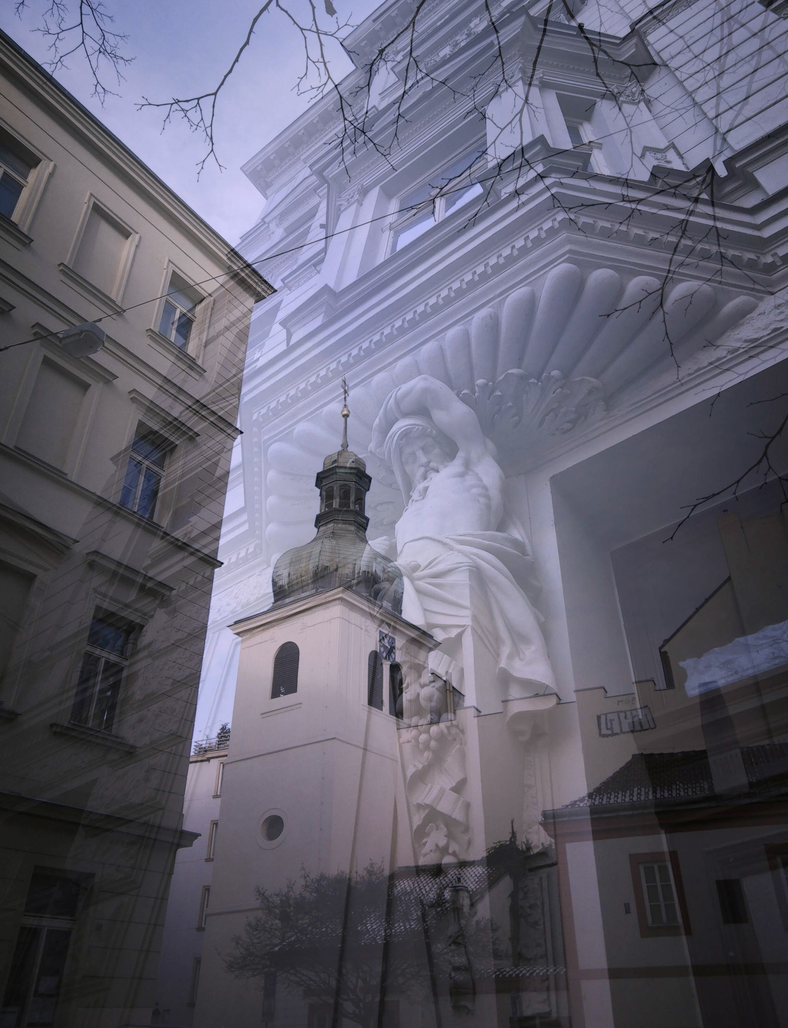 Atlas and bell tower, Prague