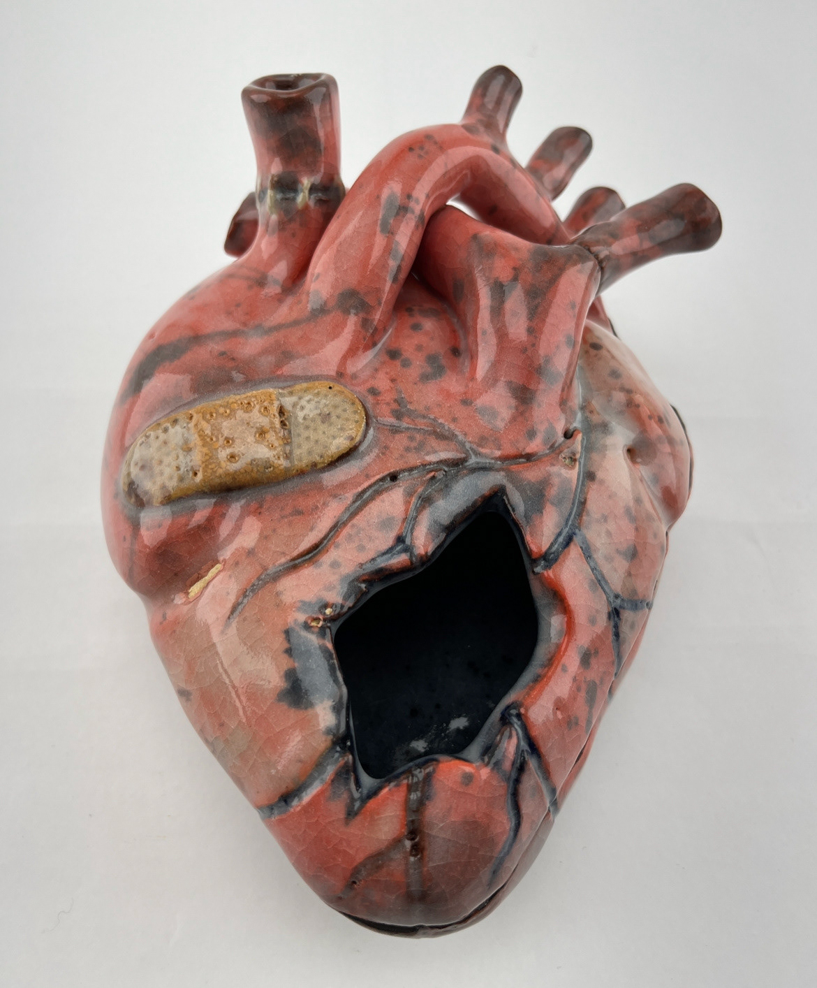 "Protect Yourself" ceramic sculpture