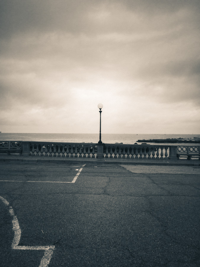 Seafront promenade with lamppost in Livorno, Tuscany, Italy