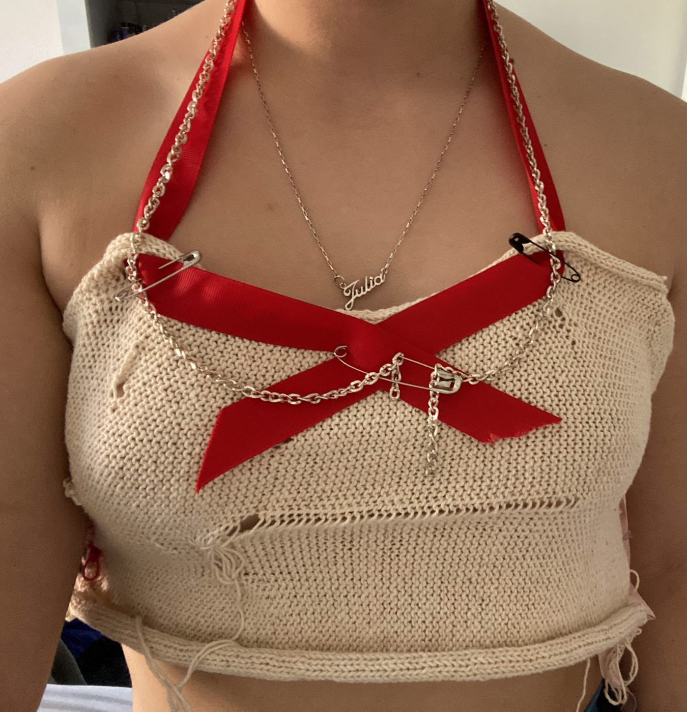 Knit top created using knitting machine.