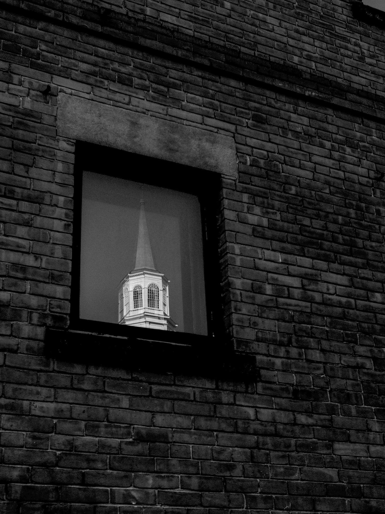Reflection of a Bell Tower