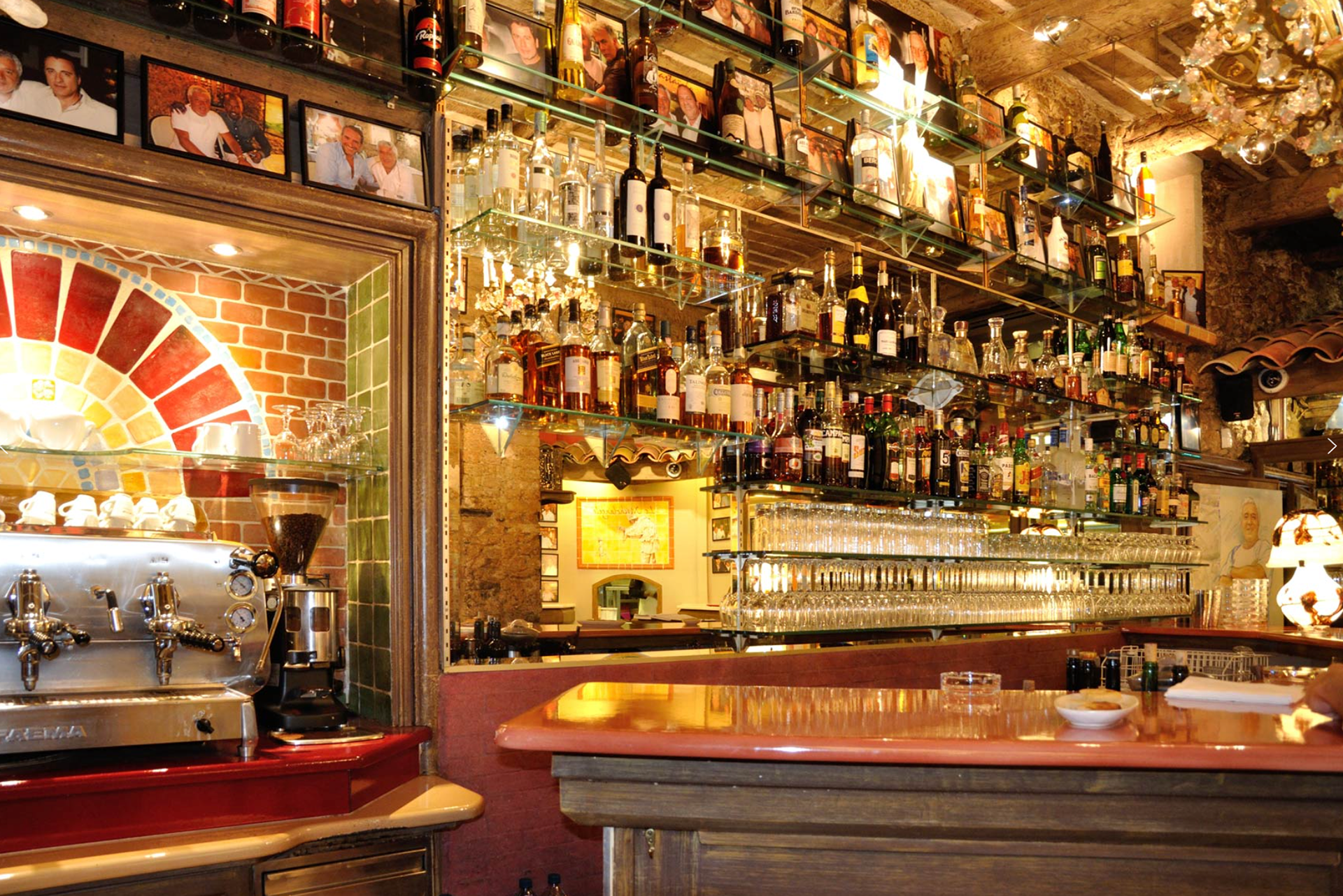 An iconic bar atmosphere filled with history, perfect for starting your evening with a classic Italian aperitivo.
