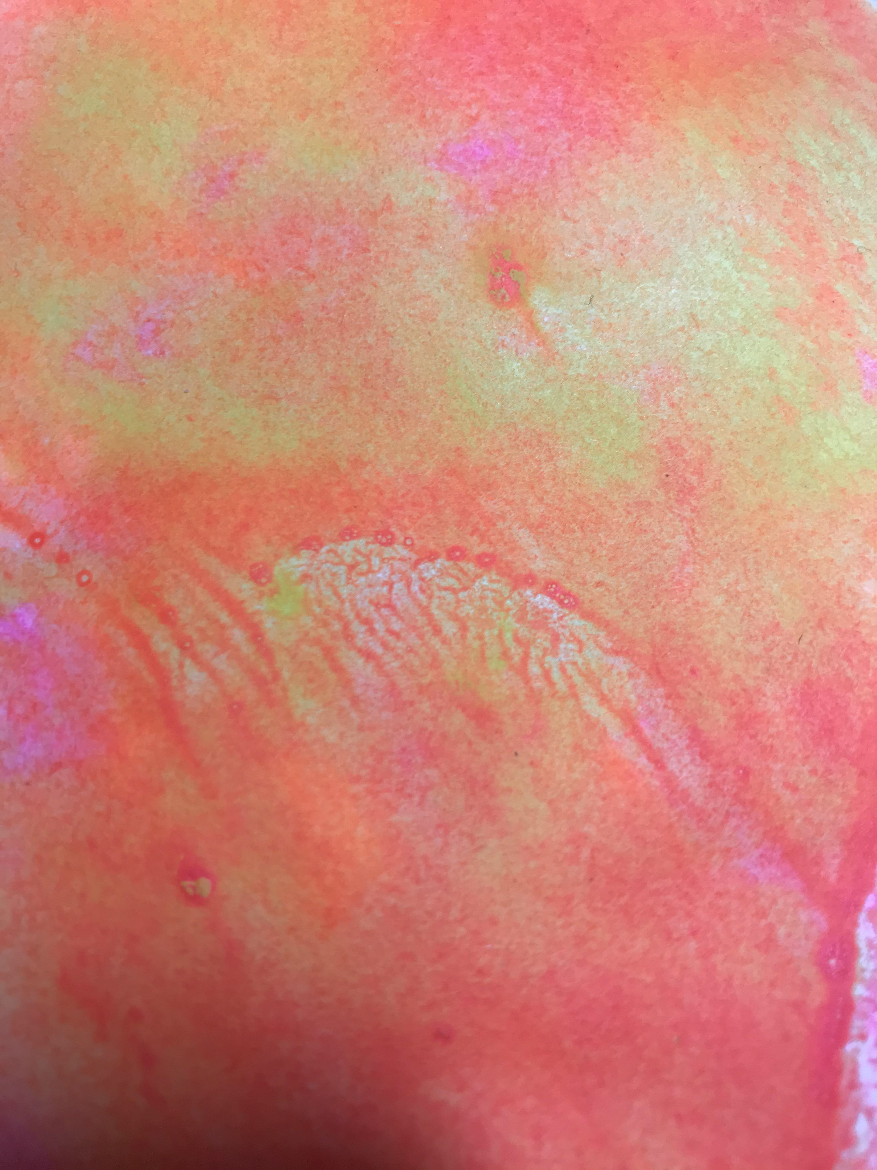 After experimenting with the blobs of in I did a butterfly effect by folding the paper in half. I like how there are drops of the first ones I did of yellow which you couldn't see at the top of the puddle due to the thickness.
