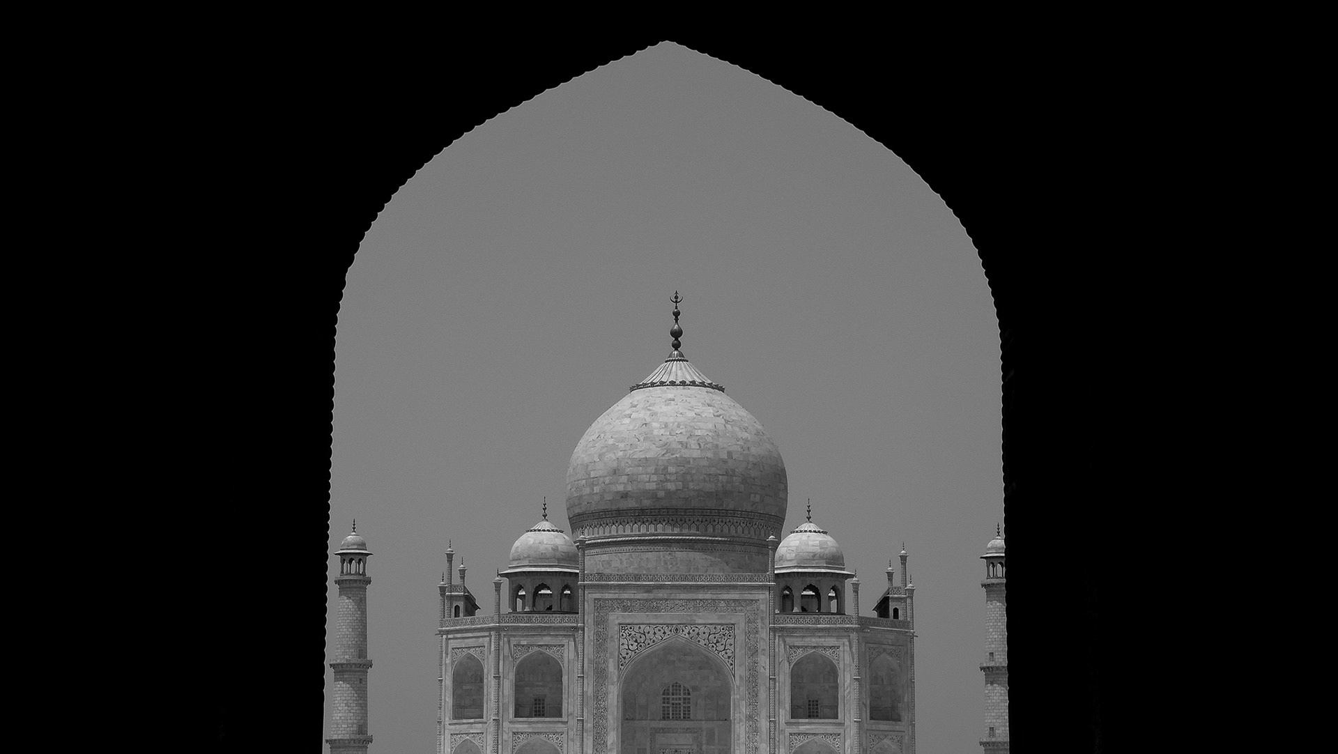 Dark shadows and arches frame the Taj Mahal in India by Ryan Bucchianeri.