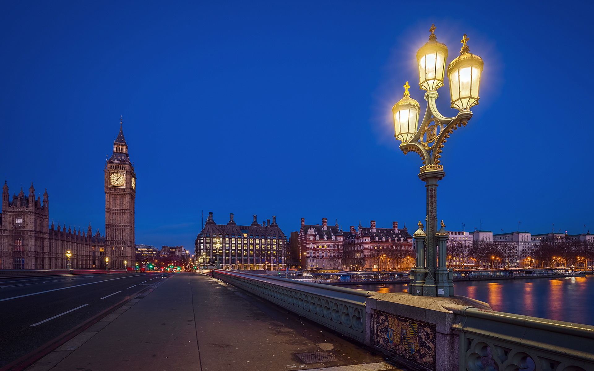 Street lamp on Westminster Bridge by night with Big Ben at background
