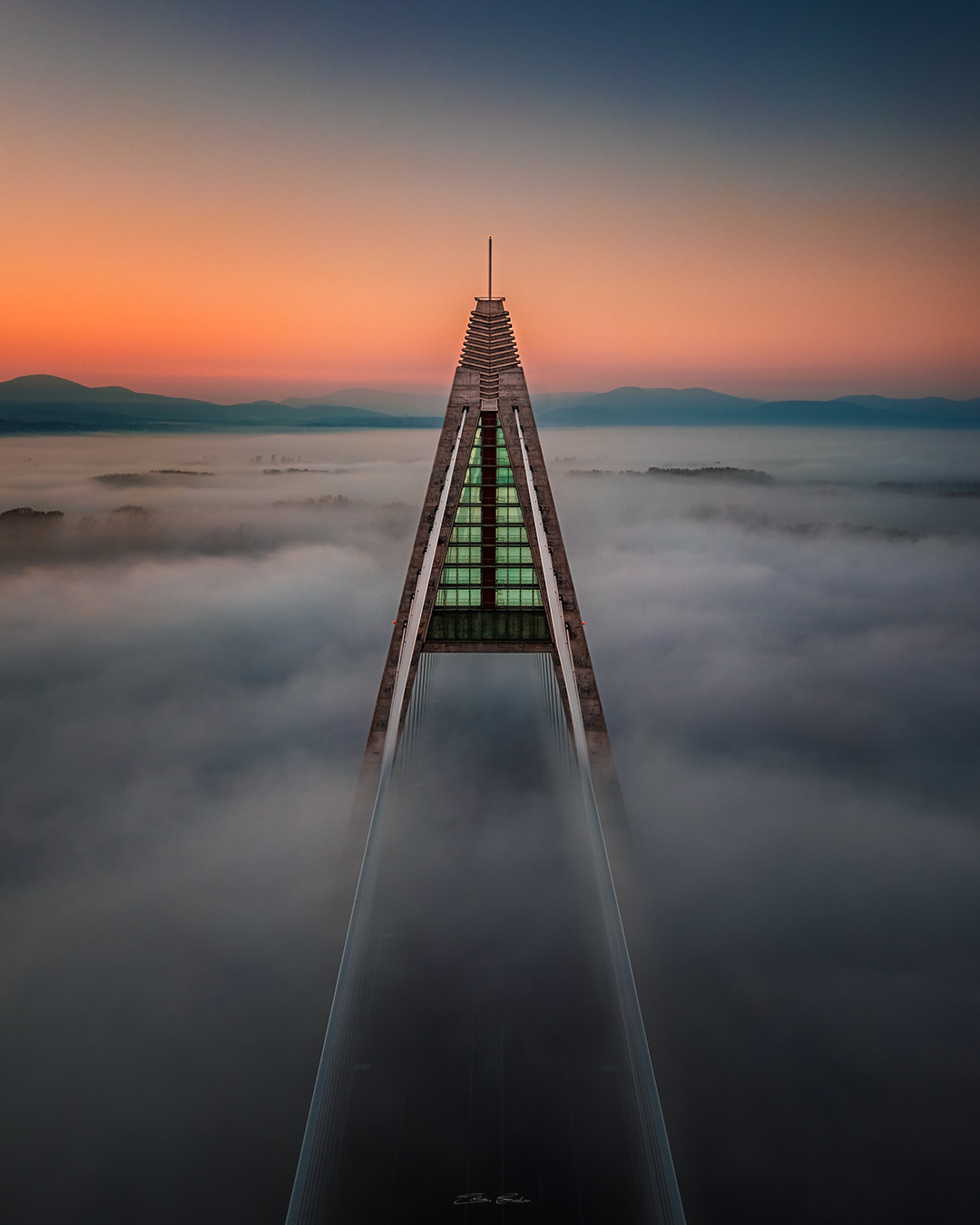 Megyeri Bridge in heavy autumn fog from above