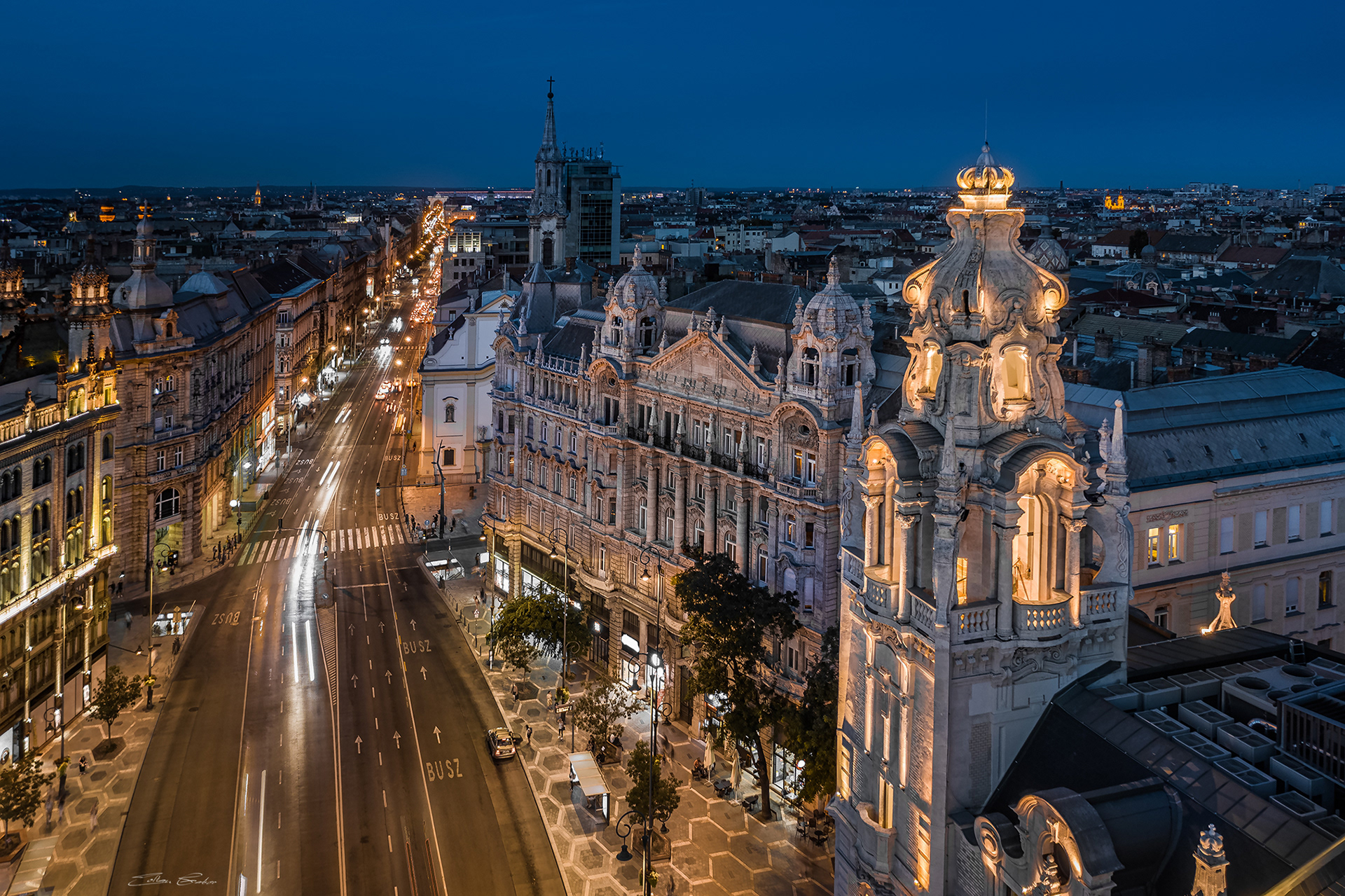 Aerial view of Ferenciek tere (Square of the Franciscans) and Szabad Sajtó street at dusk.