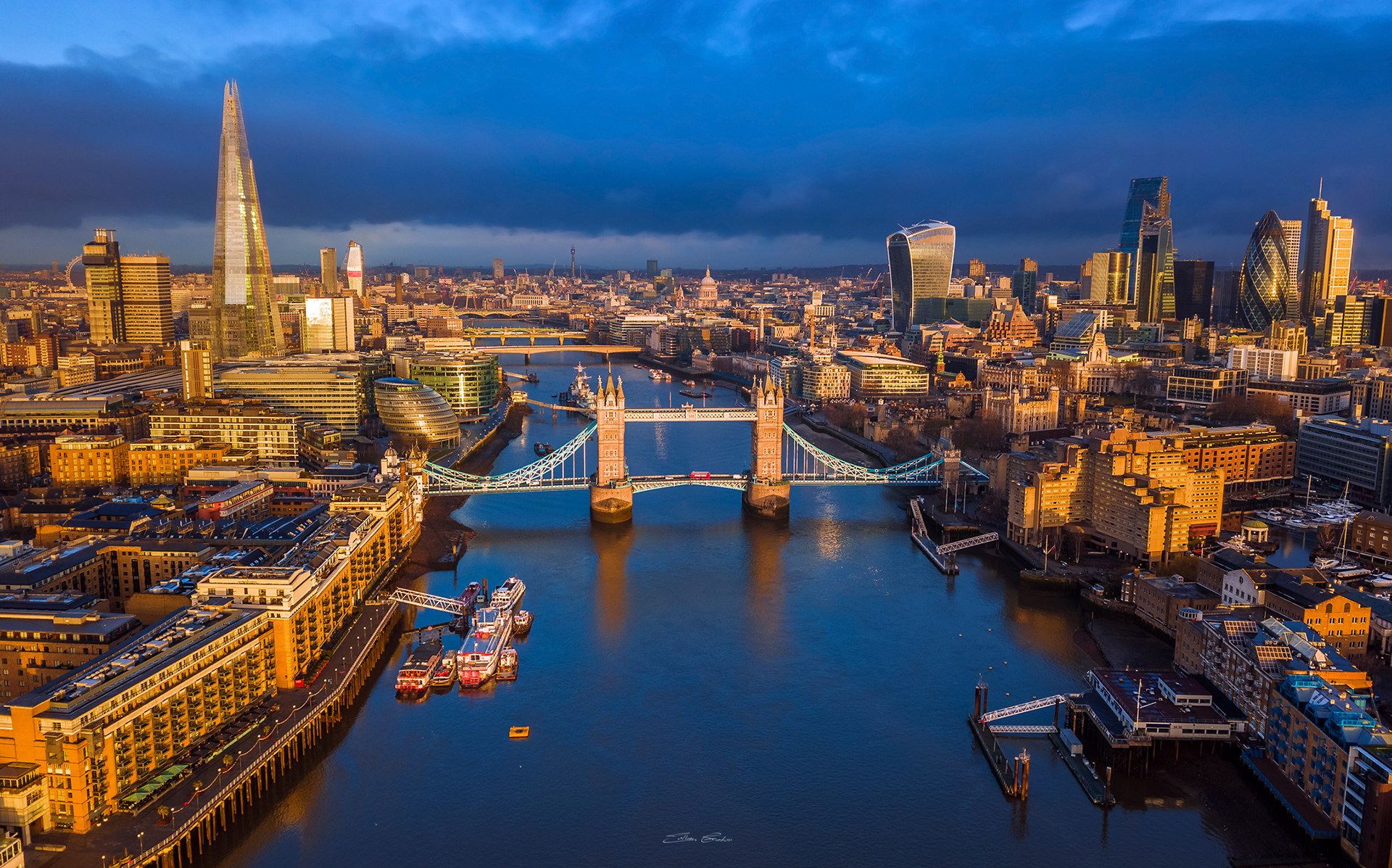 Aerial panoramic view of Tower Bridge at sunrise