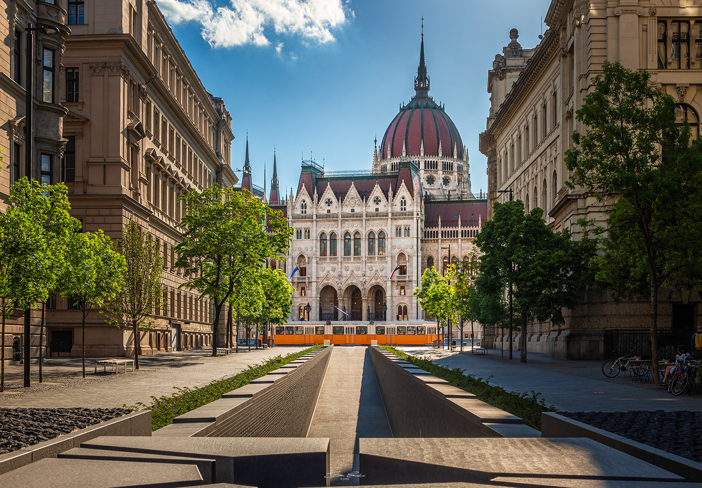 Parliament of Hungary with Yellow Tram at the Trianon Memorial