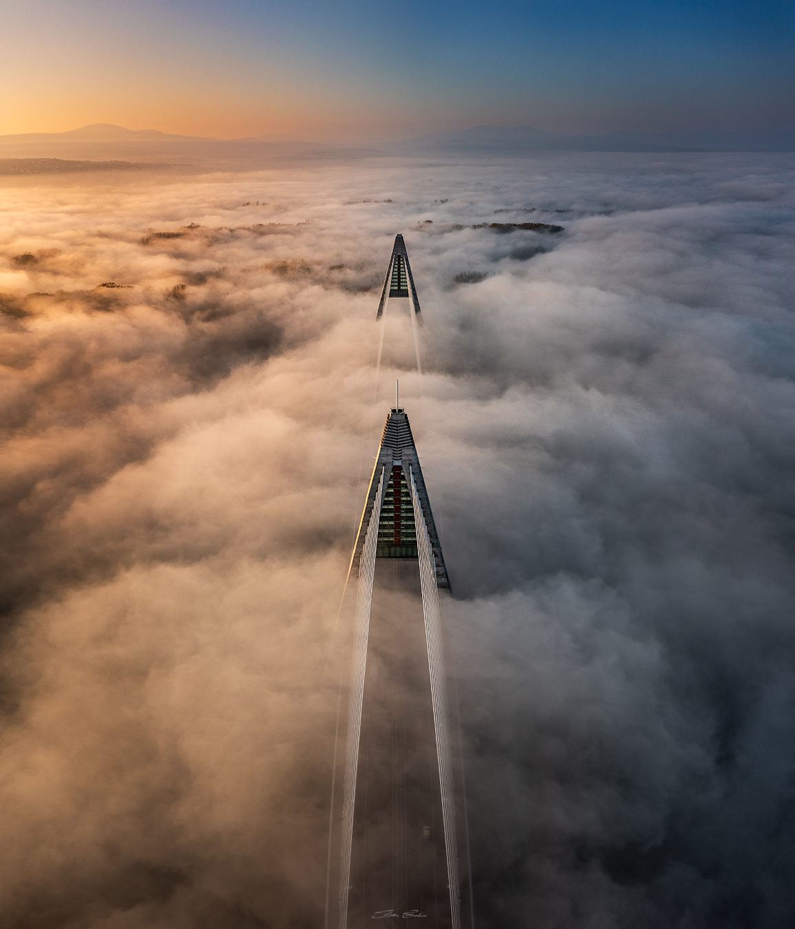 Megyeri Bridge in heavy autumn fog from above