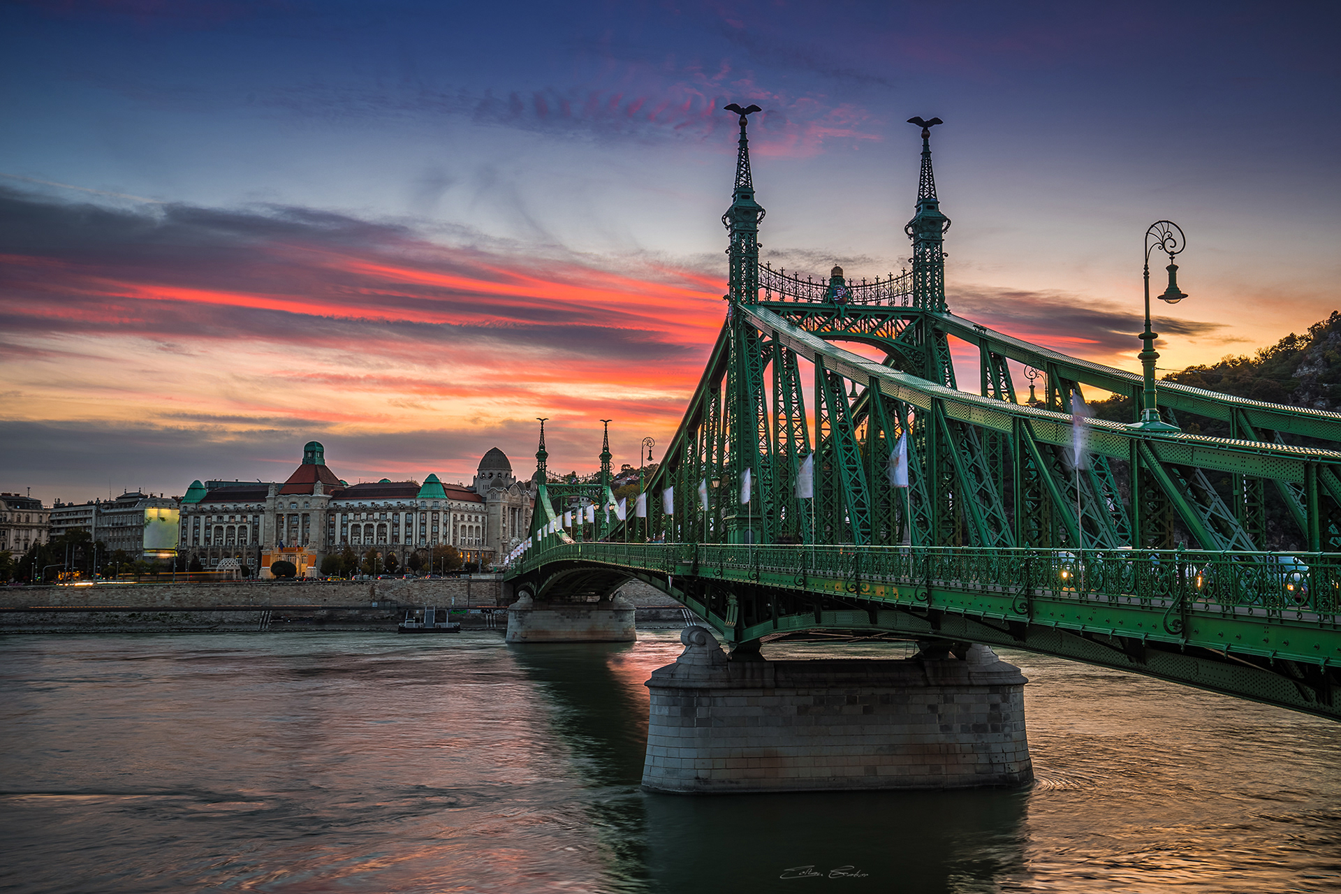 Liberty Bridge and Hotel Gellert at sunset