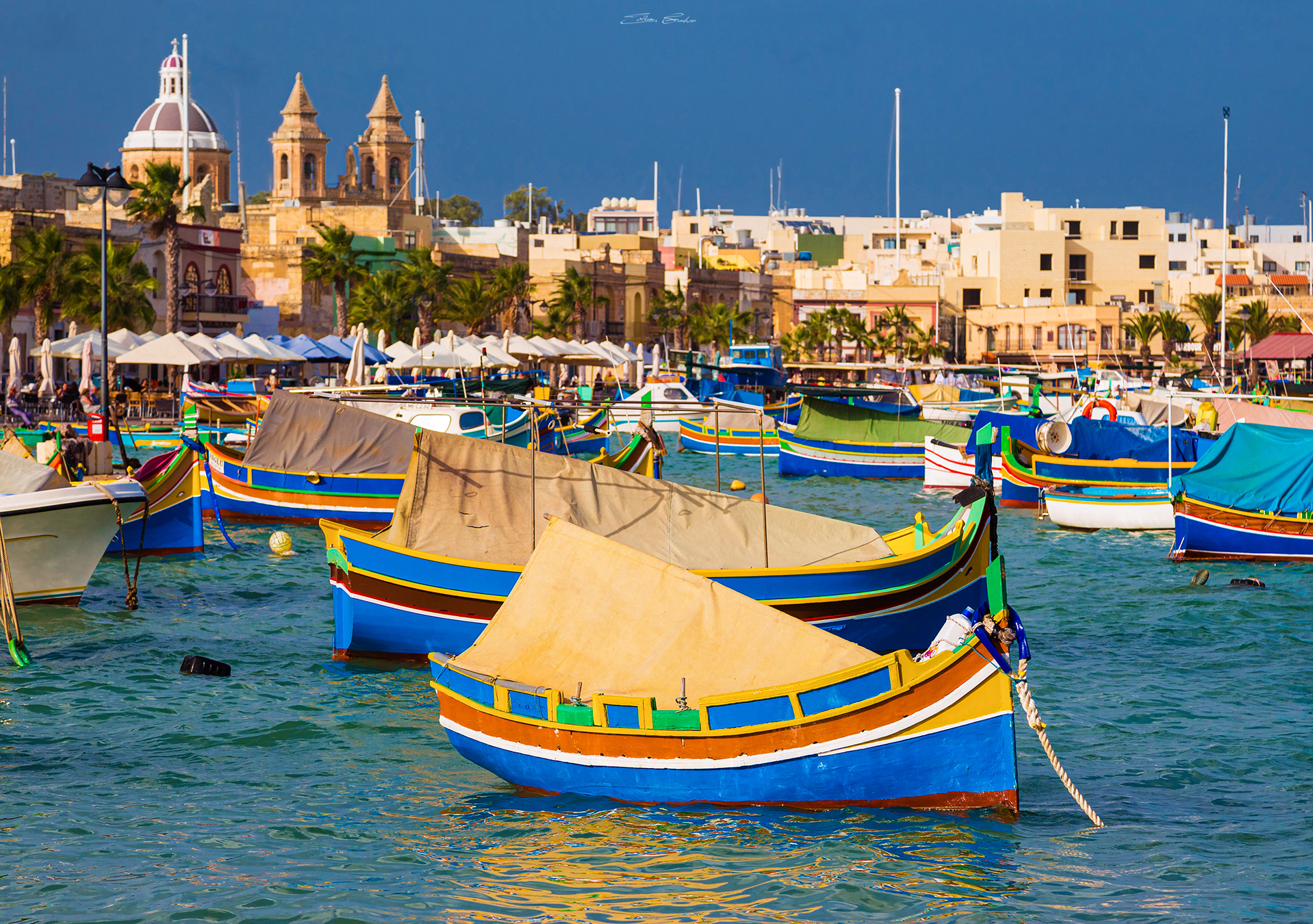 Traditional Maltese Luzzu boats at Marsaxlokk