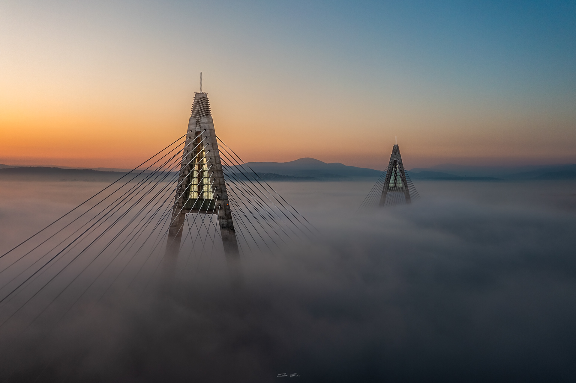 Megyeri Bridge in heavy autumn fog from above