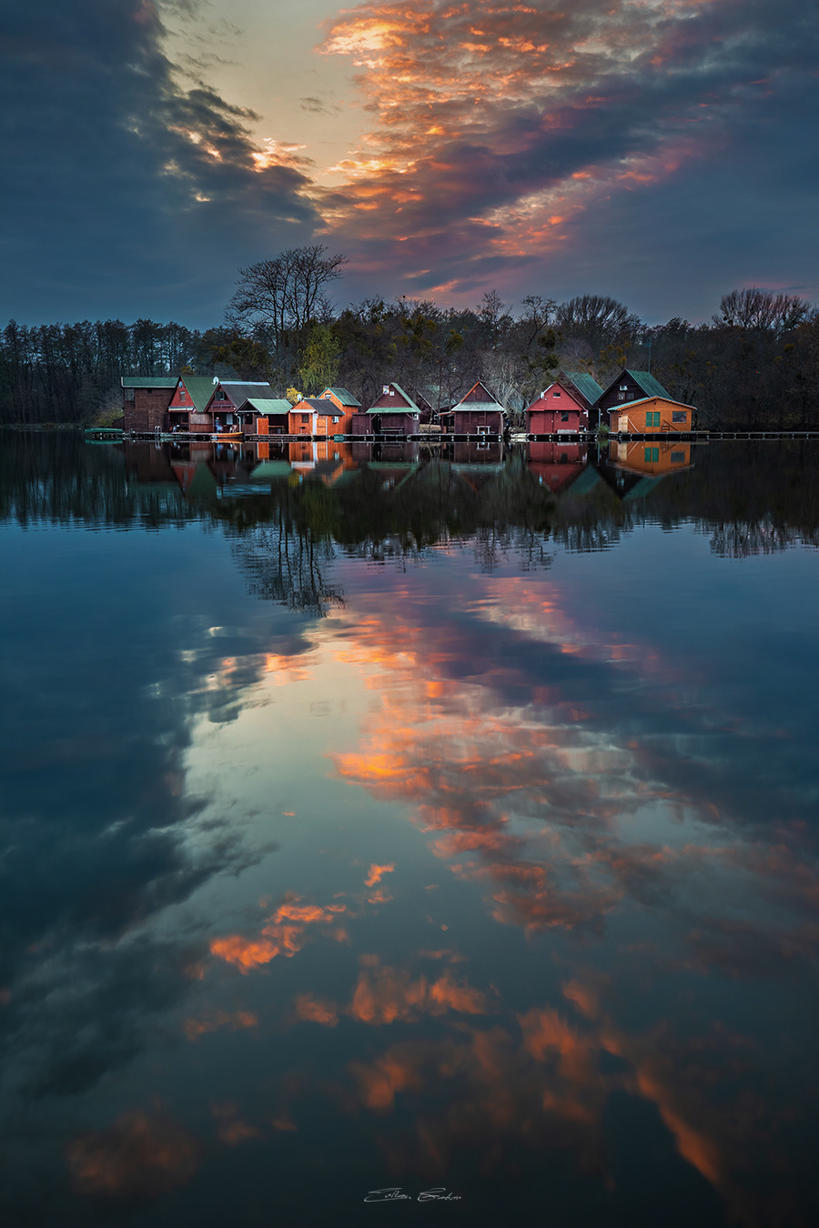 Small Island with colourful Fishing Huts at sunset