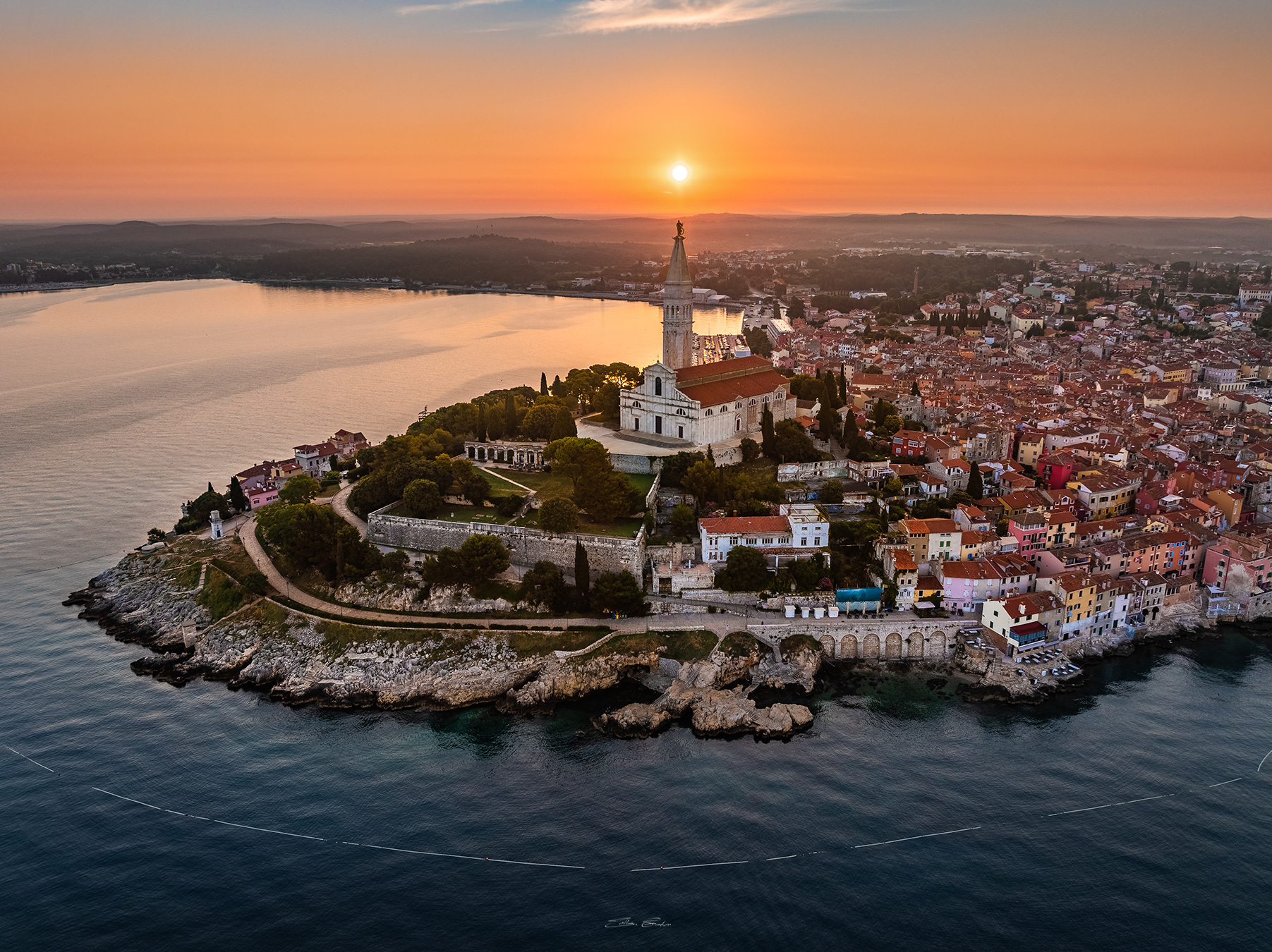 Aerial view of Rovinj, Croatia with rising sun