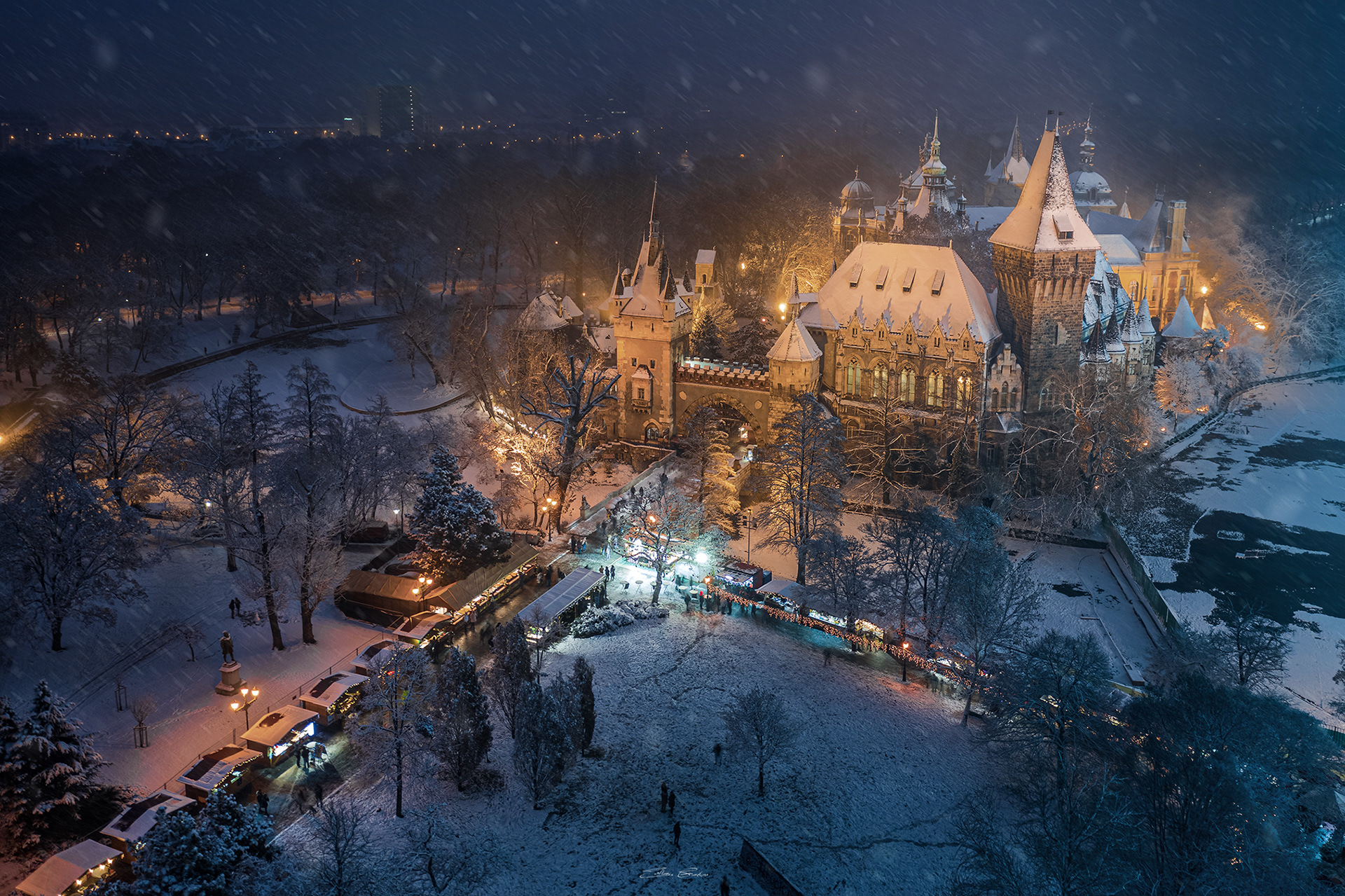 Aerial view of Vajdahunyad Castle on a Snowy Night in City Park