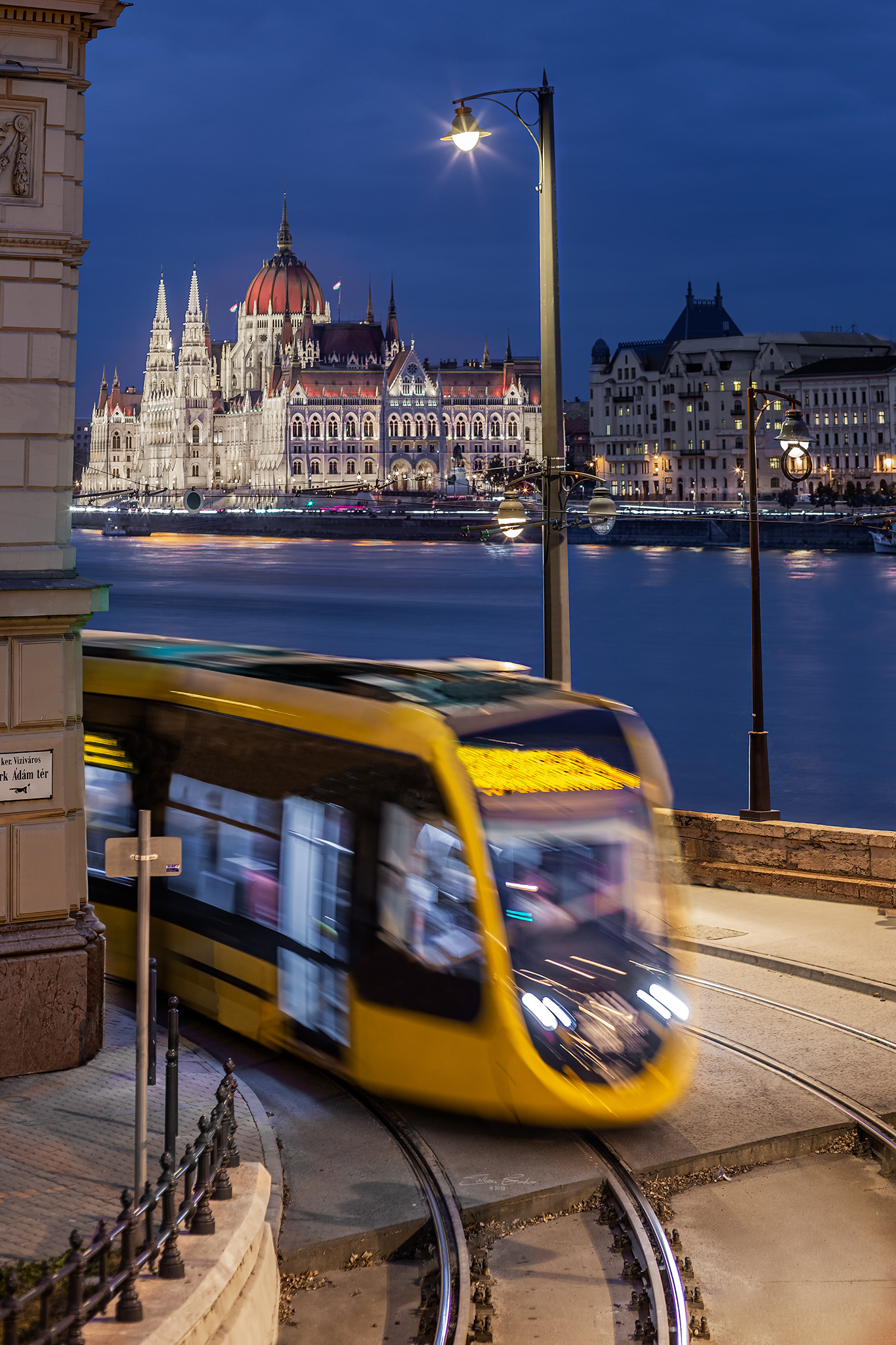 Yellow tram and Parliament of Hungary