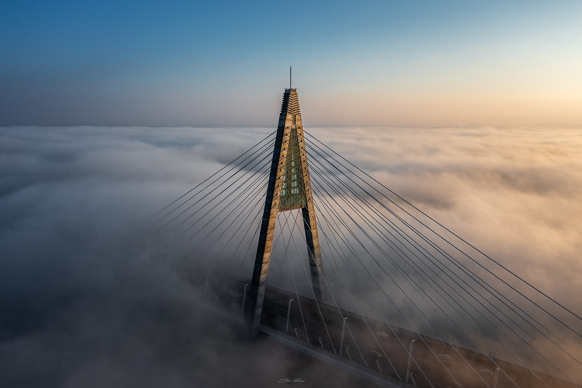 Megyeri Bridge in heavy autumn fog from above