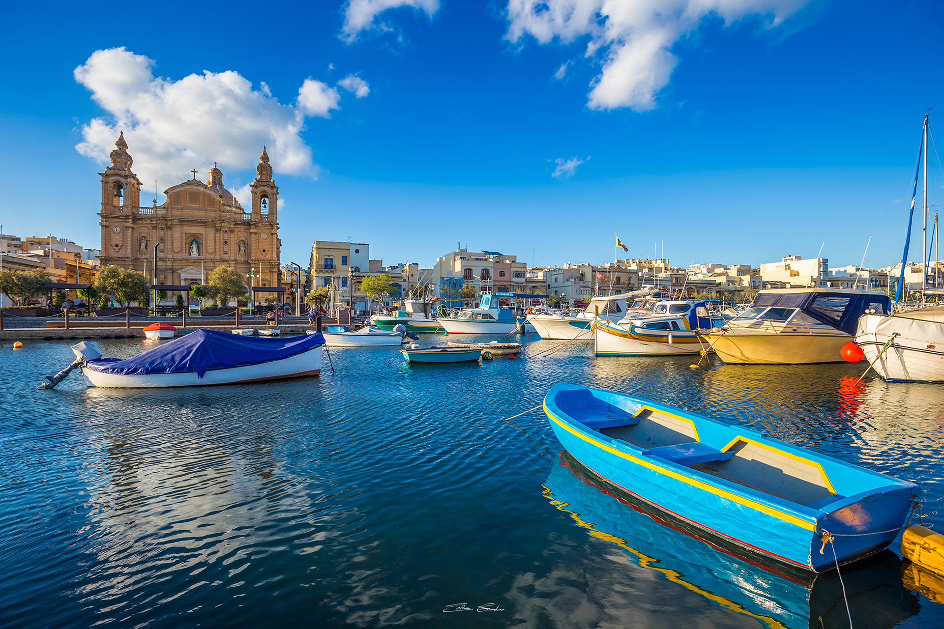 Maltese boats and St Joseph's Church - Msida