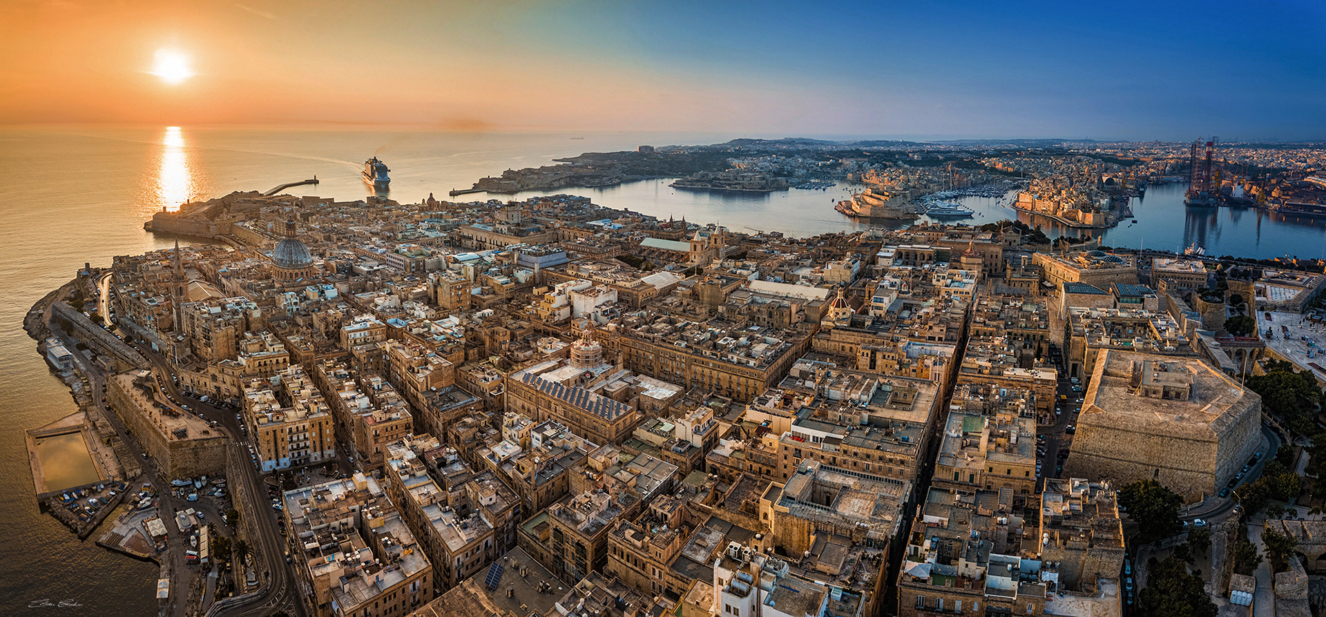 Aerial panoramic view of Valletta at sunrise
