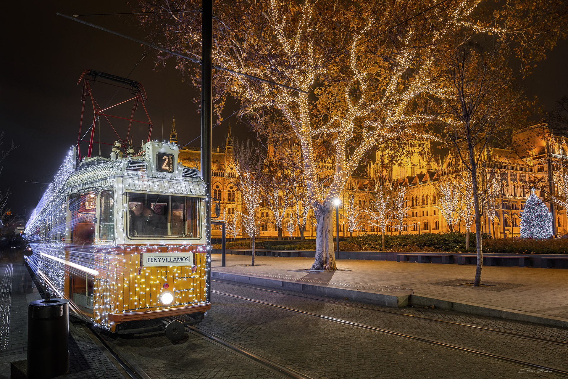 Christmas Light Tram at the Parliament Building - Budapest, Hungary