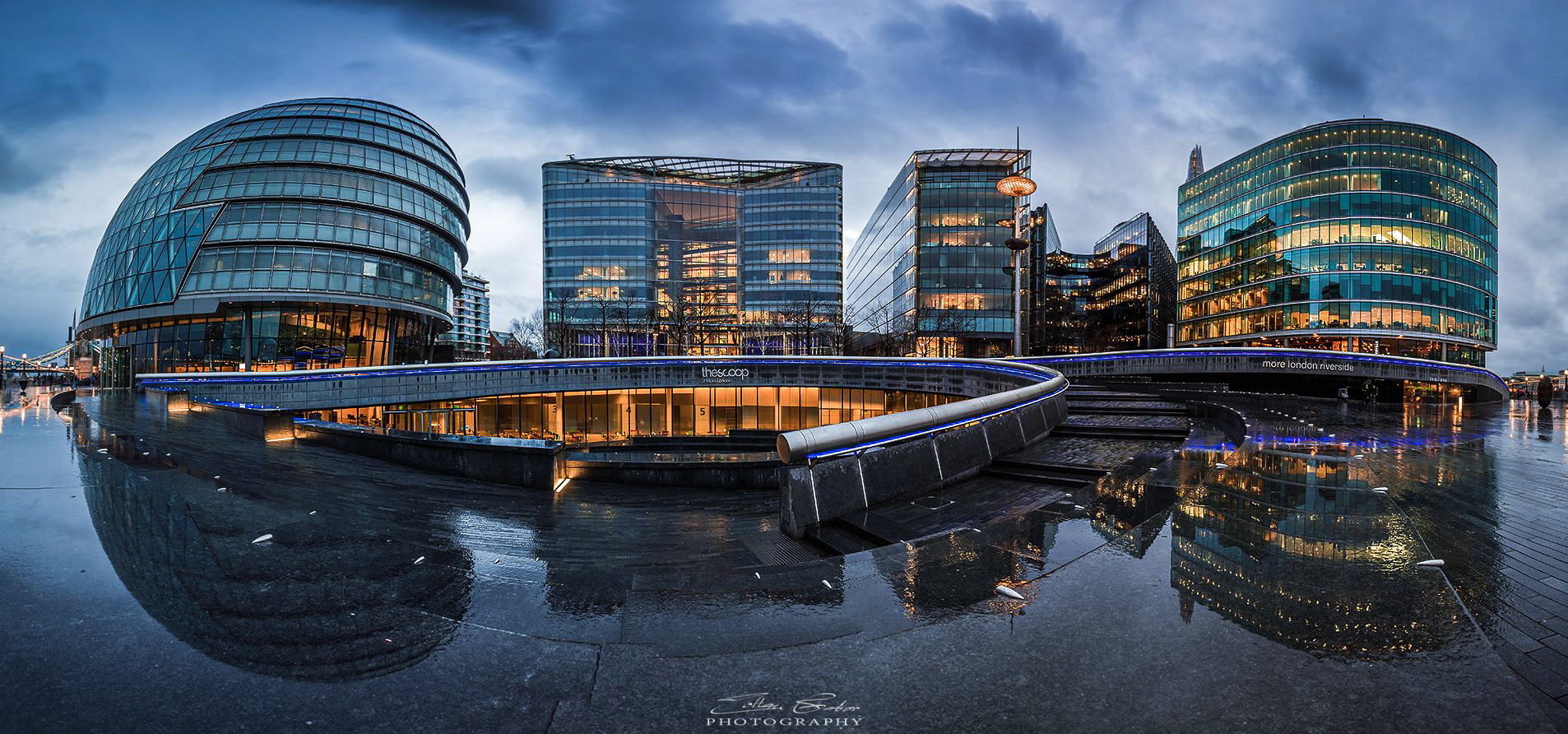 The Scoop - City Hall building and other office buildings at downtown of London on a rainy day