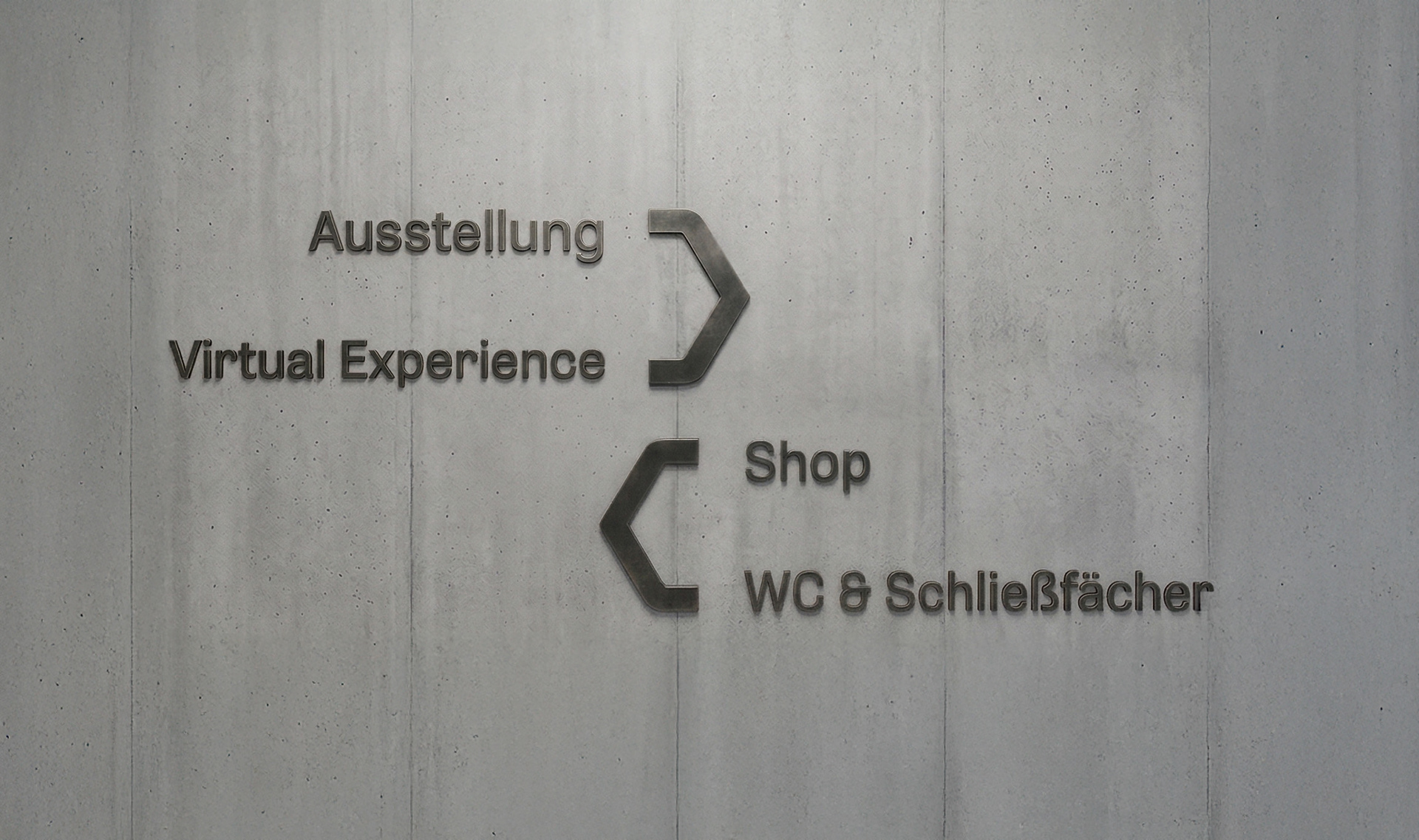 Leitsystem mit Design-Elementen (Pfeilen basierend auf dem Branding/Logo)