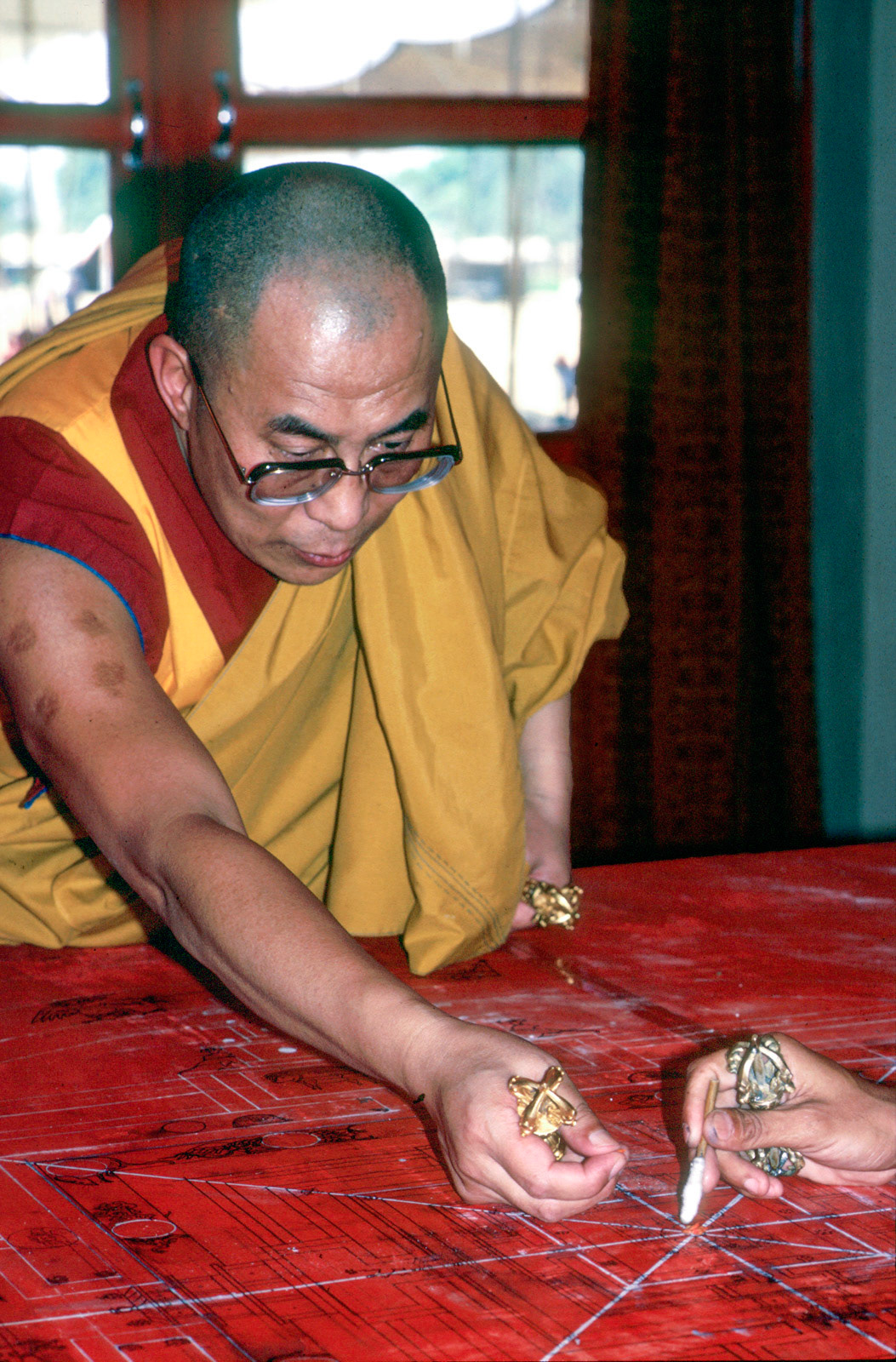 The Dalai Lama creating the Kalachakra mandala. Bodh Gaya, India